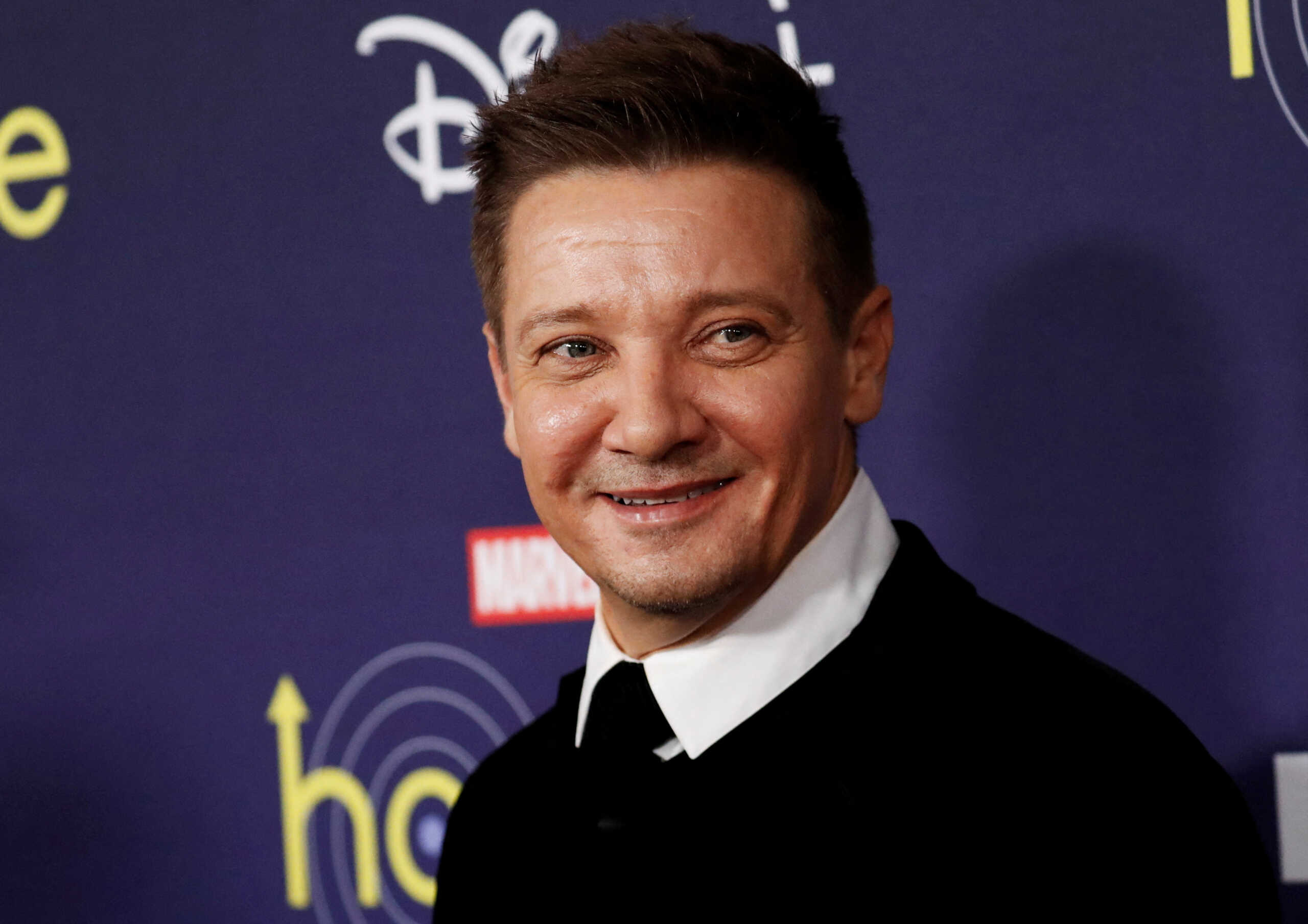 FILE PHOTO: Actor Jeremy Renner poses for a picture during the premiere of the television series Hawkeye at El Capitan theatre in Los Angeles, California, U.S. November, 17, 2021. REUTERS