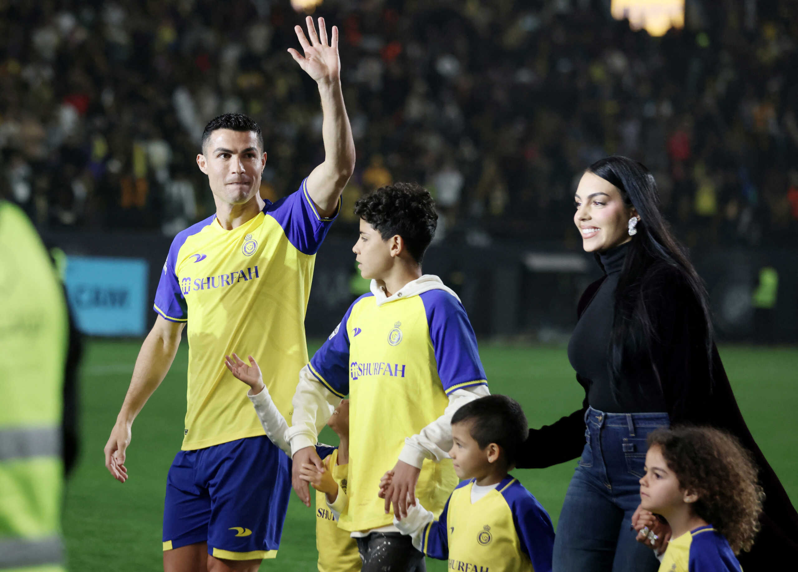 Soccer Football - Al Nassr unveil new signing Cristiano Ronaldo - Mrsool Park, Riyadh, Saudi Arabia - January 3, 2023  New Al Nassr signing Cristiano Ronaldo with his partner Georgina Rodriguez and kids during his presentation REUTERS