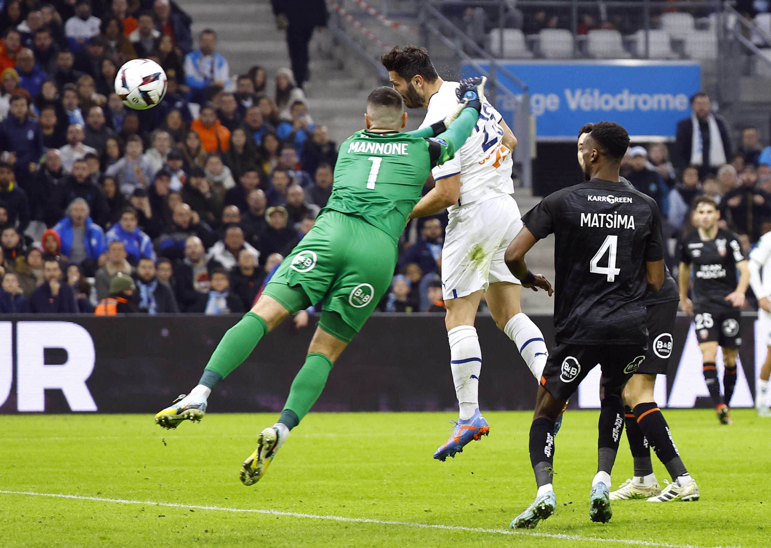 Soccer Football - Ligue 1 - Olympique de Marseille v Lorient - Orange Velodrome, Marseille, France - January 14, 2023 Olympique de Marseille's Sead Kolasinac scores their first goal passed Lorient's Vito Mannone REUTERS