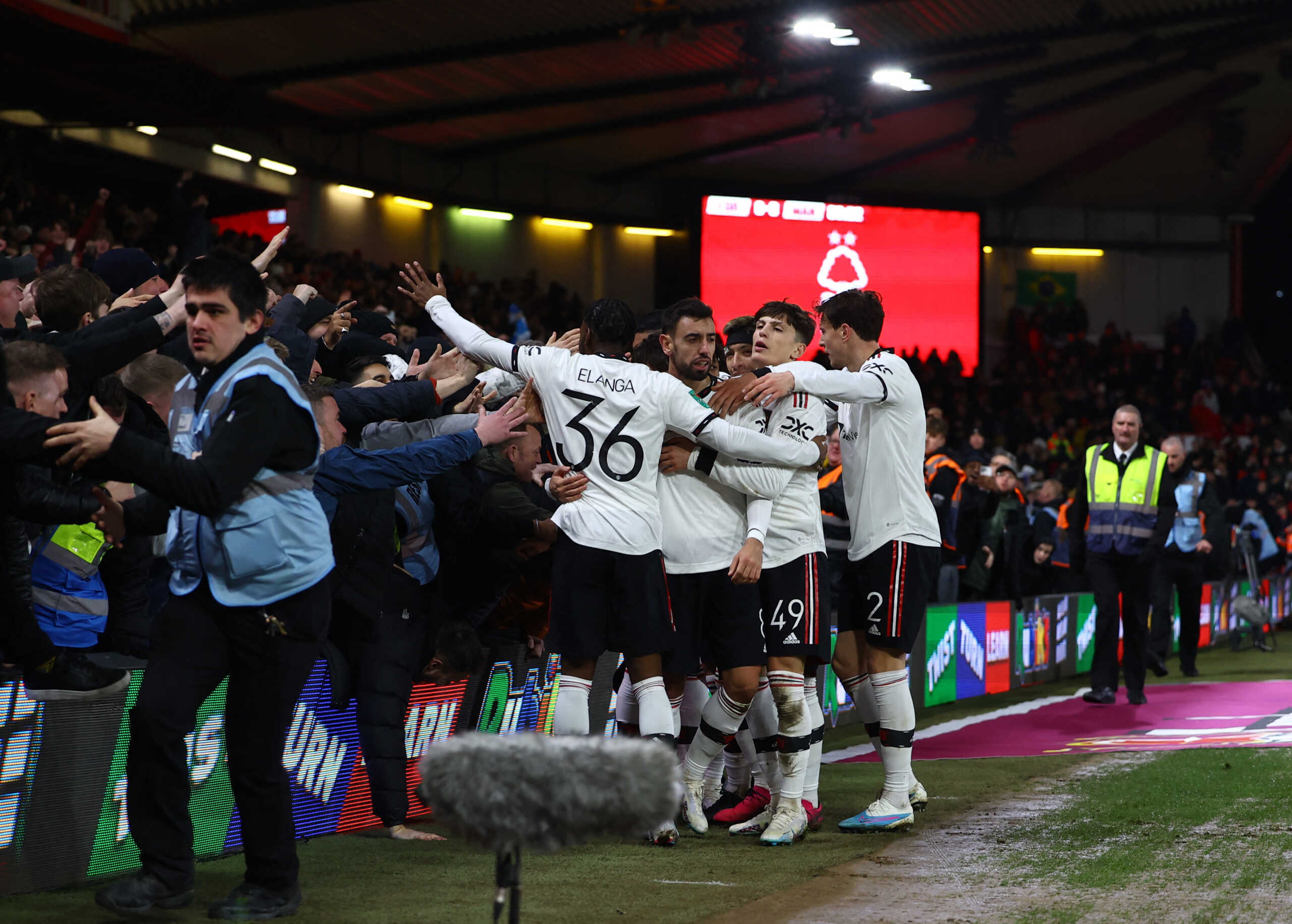 Soccer Football - Carabao Cup - Semi Final - First Leg - Nottingham Forest v Manchester United - The City Ground, Nottingham, Britain - January 25, 2023 Manchester United's Bruno Fernandes celebrates scoring their third goal with teammates REUTERS