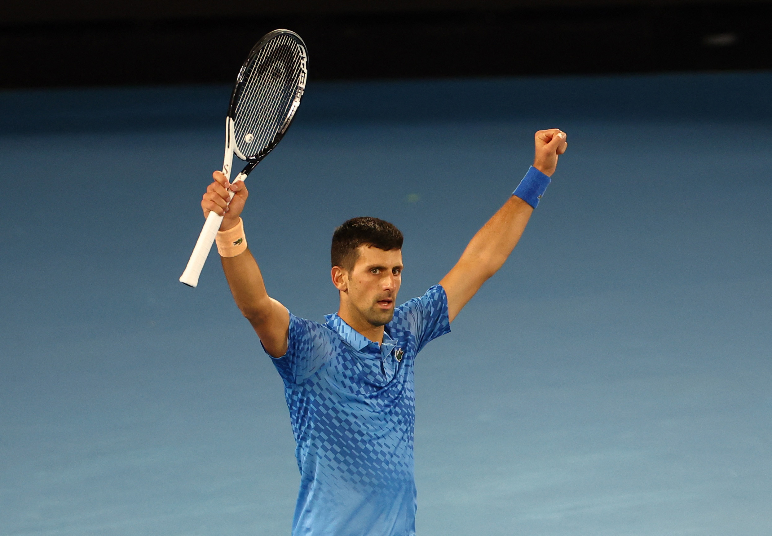 Tennis - Australian Open - Melbourne Park, Melbourne, Australia - January 21, 2023 Serbia's Novak Djokovic celebrates winning his third round match against Bulgaria's Grigor Dimitrov REUTERS