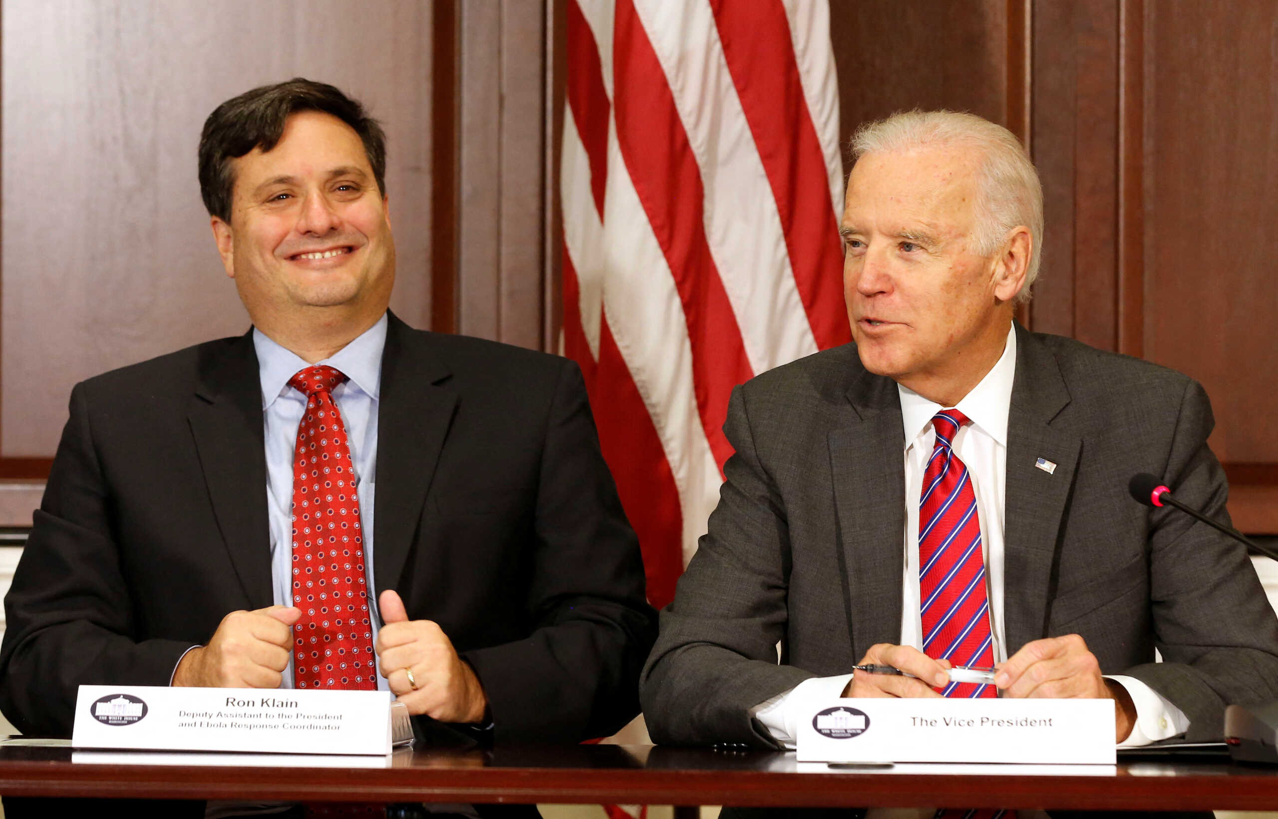 FILE PHOTO: U.S. Vice President Joe Biden (R) is joined by Ebola Response Coordinator Ron Klain (L) while he speaks with organization leaders that are responding to the Ebola crisis, while in the Eisenhower Executive Office Building on the White House complex in Washington, November 13, 2014.        REUTERS