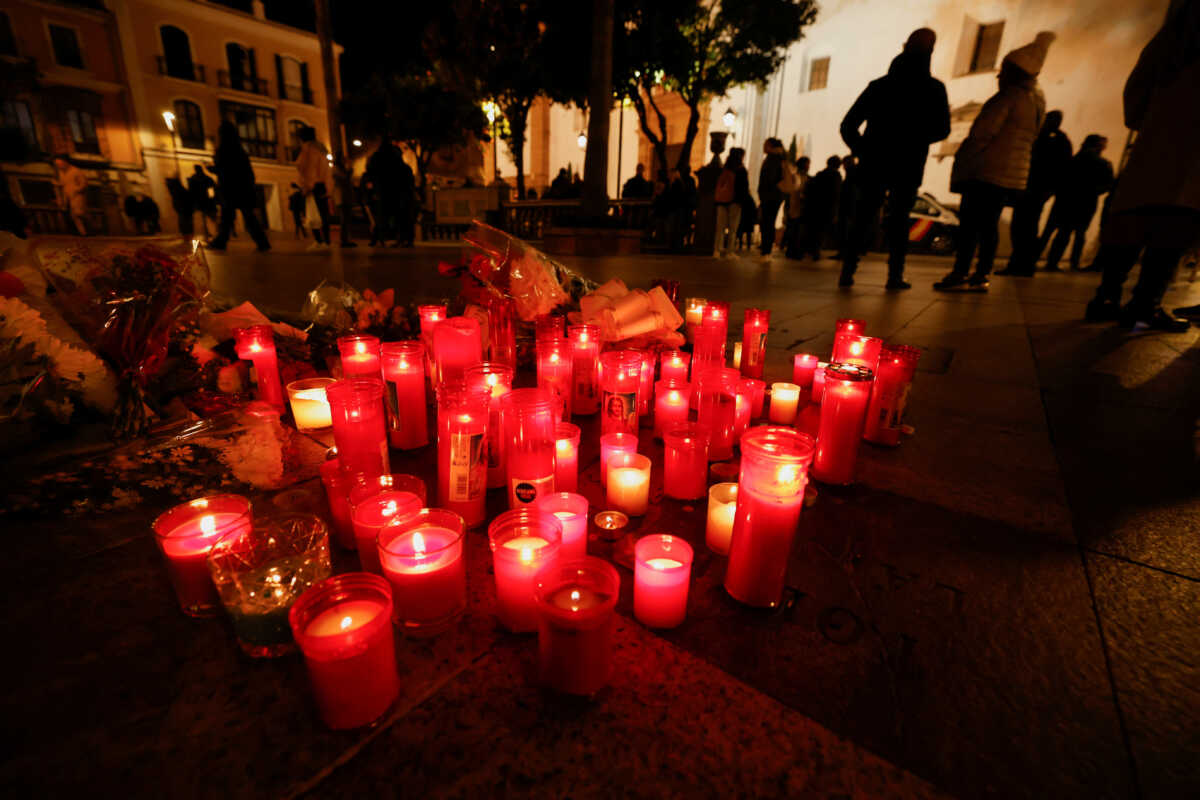 Candles are seen after two churches were attacked, with a 25-year-old Moroccan man identified as a suspect by the police, in Algeciras, Spain January 26, 2023. REUTERS