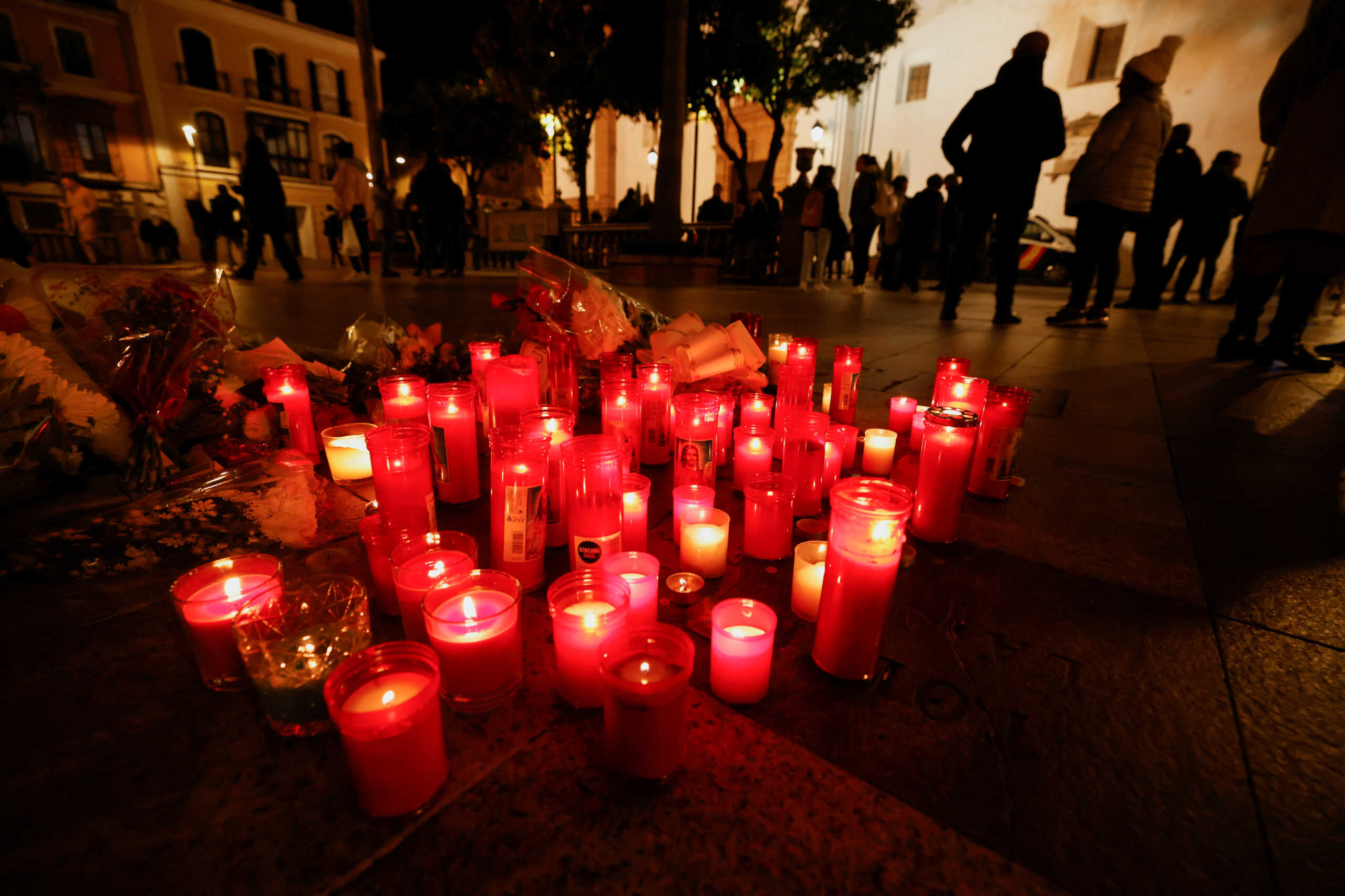 Candles are seen after two churches were attacked, with a 25-year-old Moroccan man identified as a suspect by the police, in Algeciras, Spain January 26, 2023. REUTERS