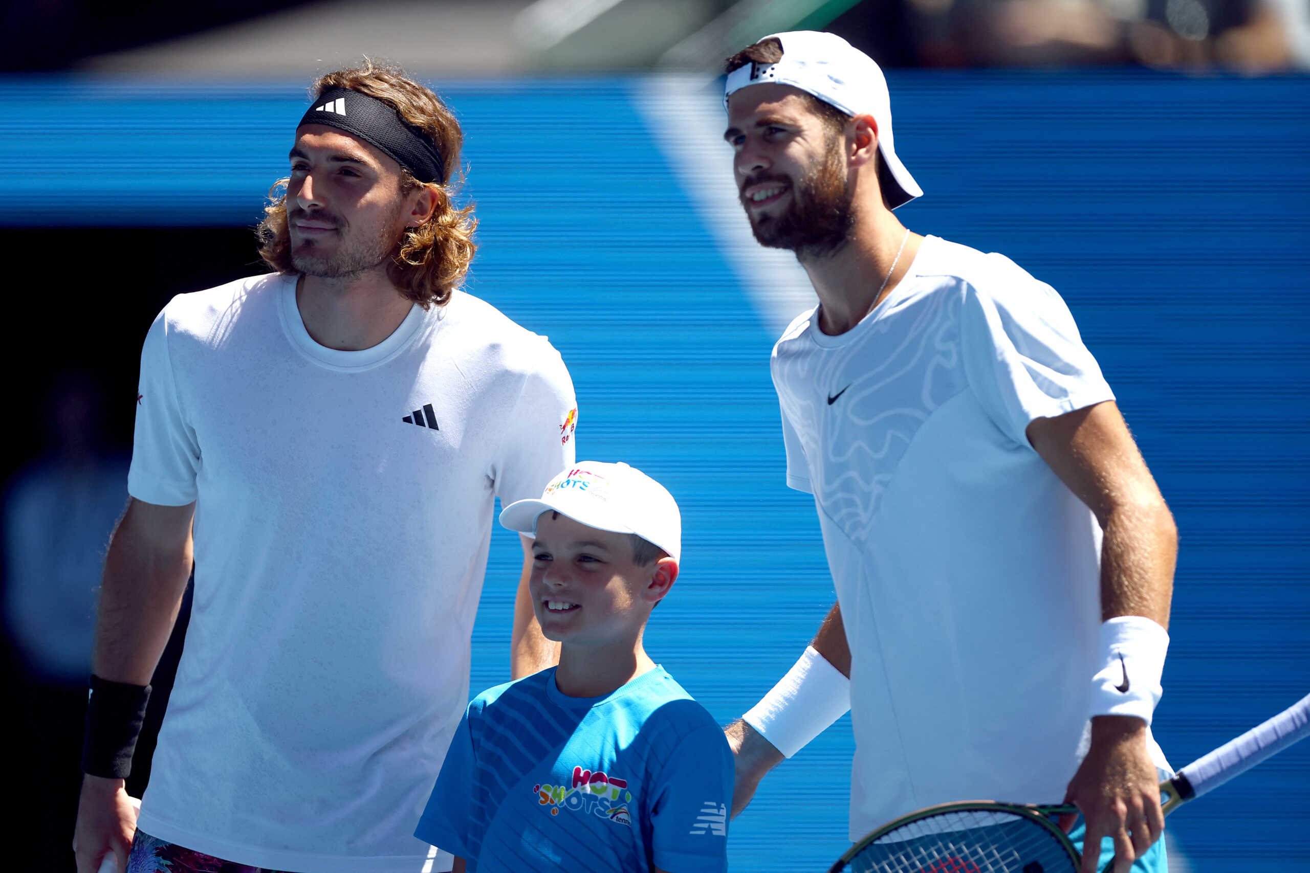 Tennis - Australian Open - Melbourne Park, Melbourne, Australia - January 27, 2023 Greece’s Stefanos Tsitsipas and Russia's Karen Khachanov pose for a photo before their semi final match REUTERS