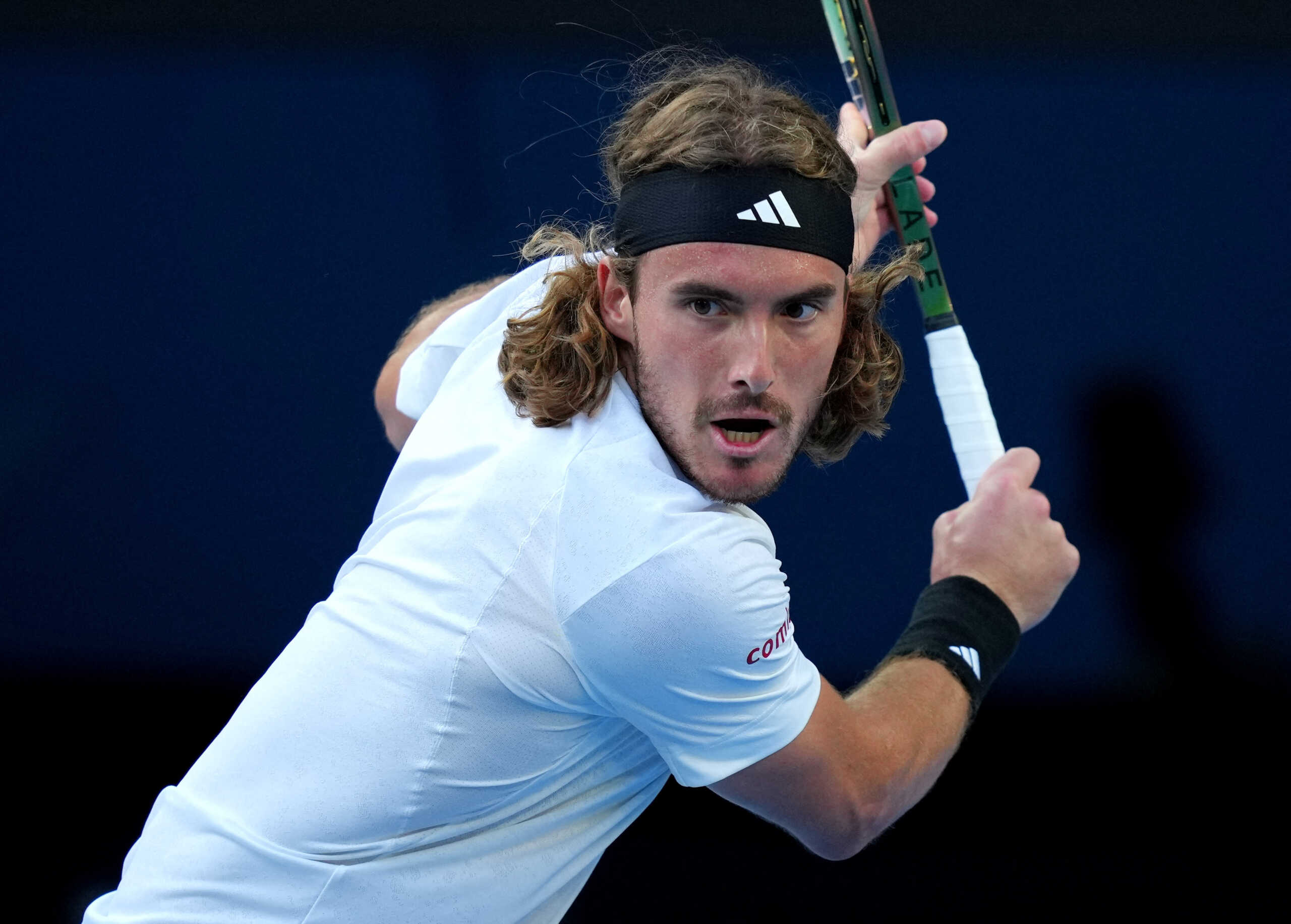 Tennis - Australian Open - Melbourne Park, Melbourne, Australia - January 22, 2023 Greece's Stefanos Tsitsipas in action during his fourth round match against Italy's Jannik Sinner REUTERS
