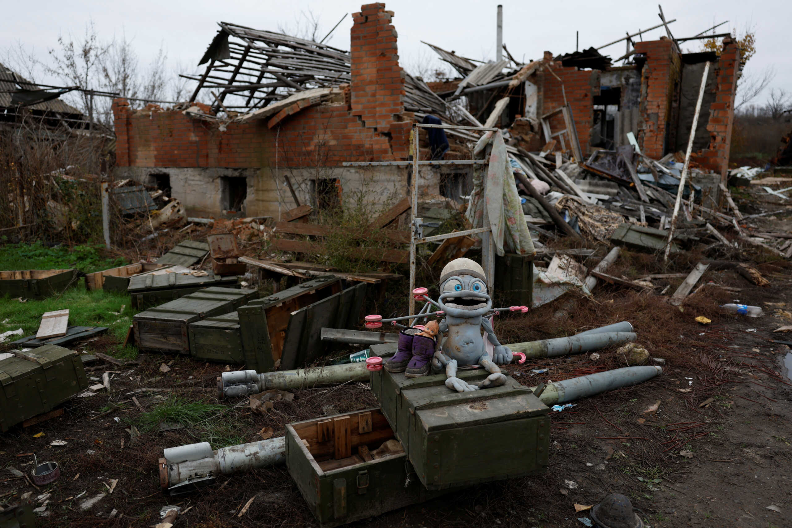 Unused rockets lie on the ground in front of a destroyed home, in the village of Kamyanka, on the outskirts of Izium, Kharkiv region, Ukraine, November 3, 2022. The Hague-based International Commission on Missing Persons, an intergovernmental organization, estimates that more than 15,000 people have gone missing across Ukraine during the war, including detainees, those separated from their loved ones and people killed and buried in makeshift graves. REUTERS