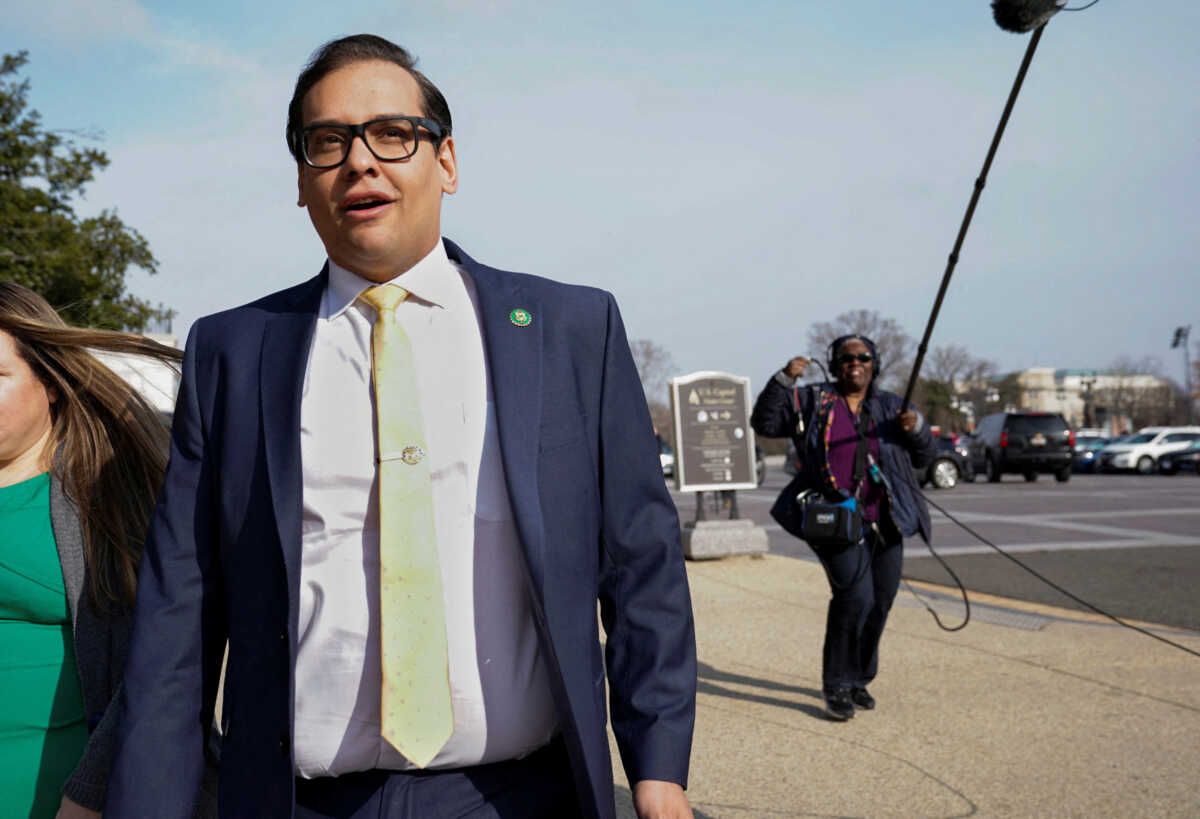 FILE PHOTO: U.S. Representative George Santos (R-NY) walks to a vote on Capitol Hill in Washington, U.S., January 12, 2023. REUTERS