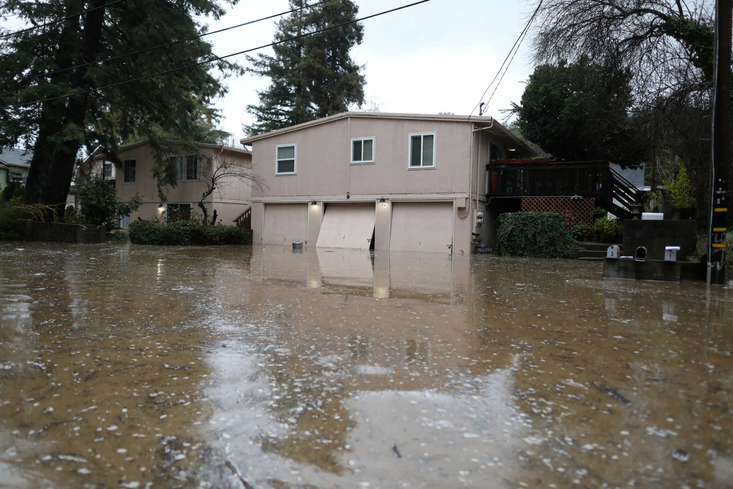The San Lorenzo River rises with emergency evacuation orders in Felton Grove, California, U.S., January 14, 2023.  REUTERS