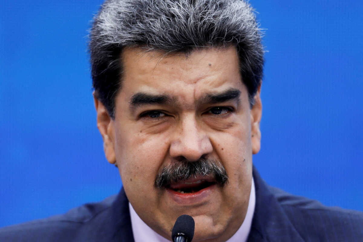 FILE PHOTO: Venezuelan President Nicolas Maduro addresses the media from the Miraflores Palace, in Caracas, Venezuela November 30, 2022. REUTERS