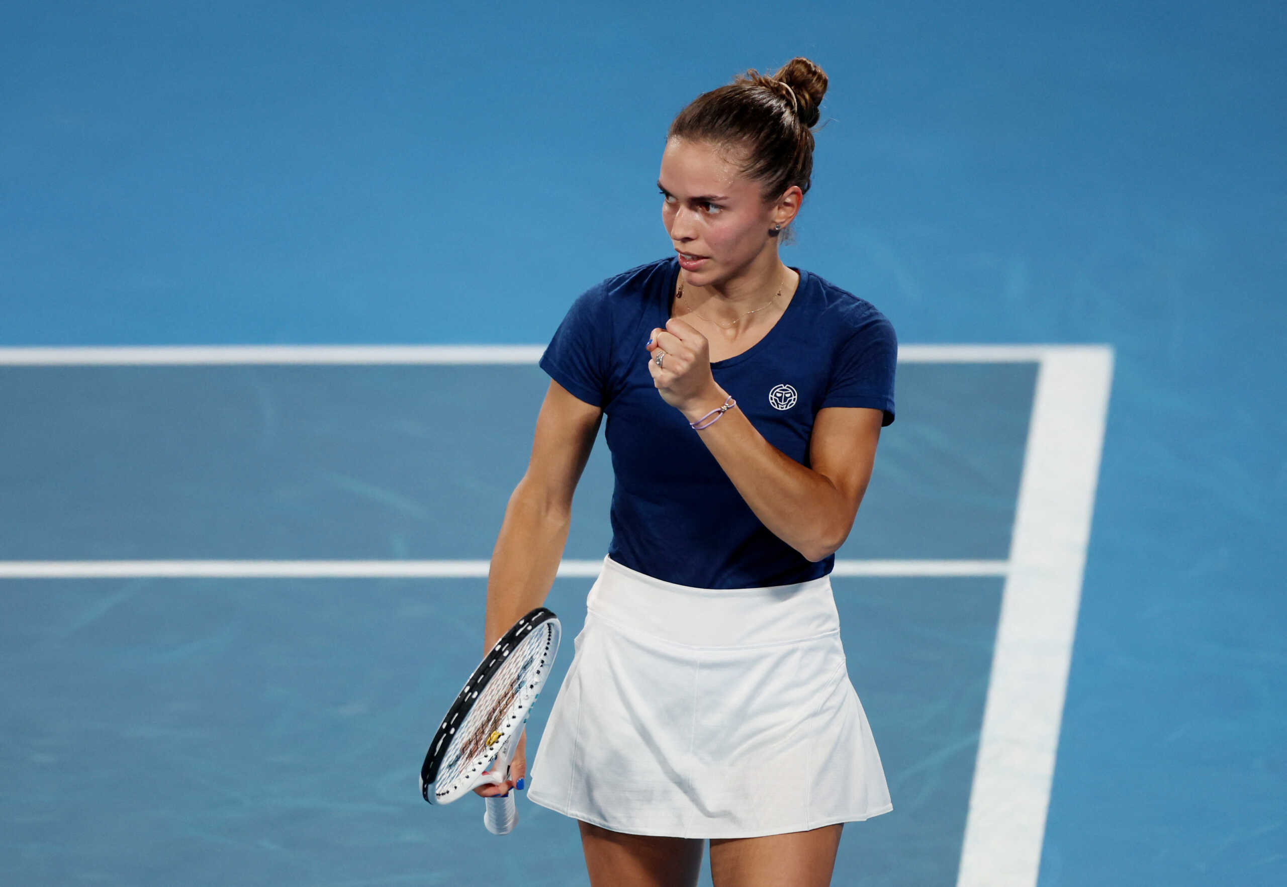 Tennis - United Cup - Ken Rosewall Arena, Sydney, Australia - January 7, 2023  Greece's Valentini Grammatikopoulou reacts during her match in the semi final against Italy's Lucia Bronzetti REUTERS
