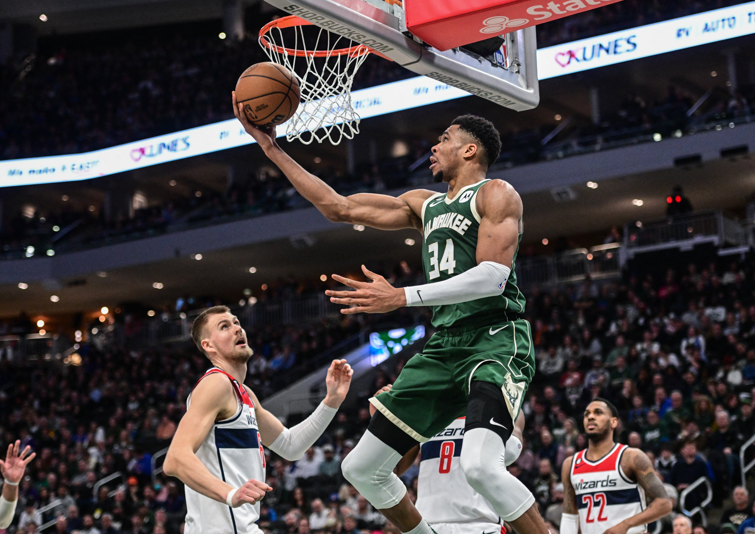 Jan 3, 2023; Milwaukee, Wisconsin, USA; Milwaukee Bucks forward Giannis Antetokounmpo (34) takes a shot in the third quarter during their game against the Washington Wizards at Fiserv Forum. Mandatory Credit: Benny Sieu-USA TODAY Sports