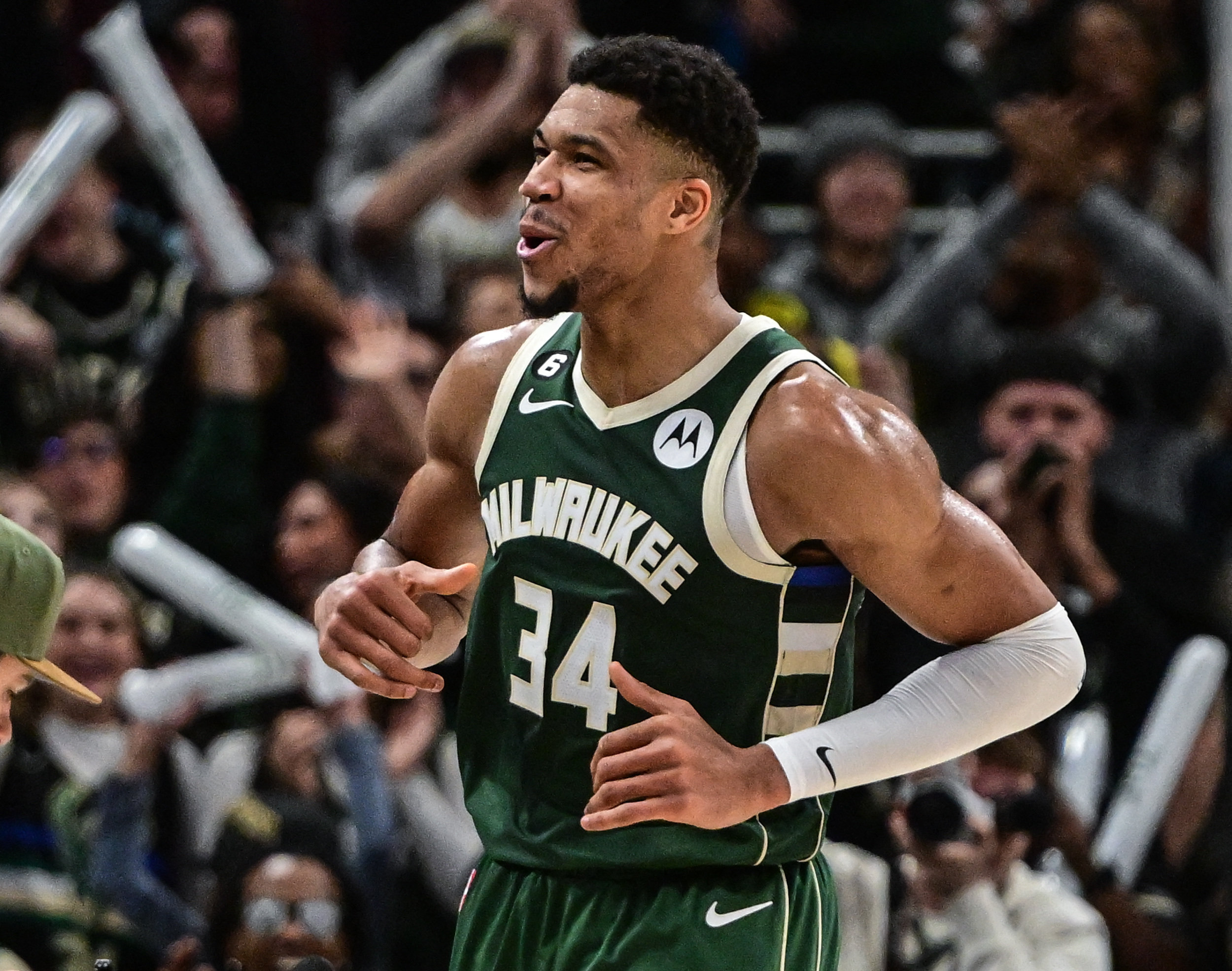 Jan 3, 2023; Milwaukee, Wisconsin, USA; Milwaukee Bucks forward Giannis Antetokounmpo (34) reacts in the fourth quarter after scoring a career high 55 point during their game against the Washington Wizards at Fiserv Forum. Mandatory Credit: Benny Sieu-USA TODAY Sports