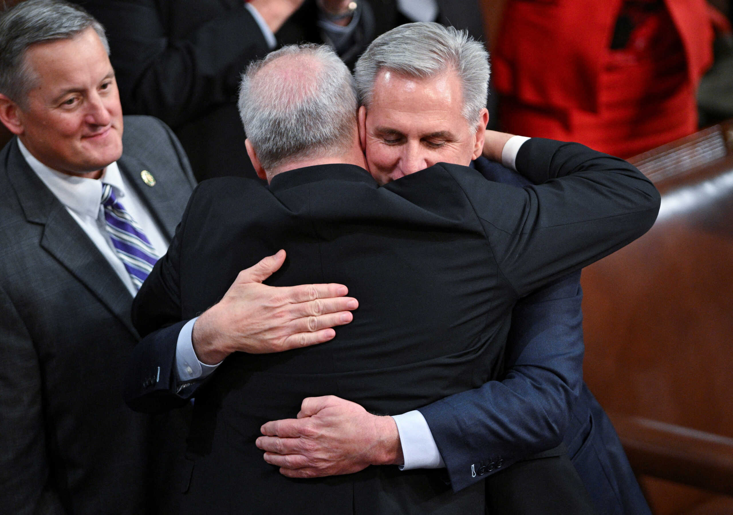 U.S. House Republican Leader Kevin McCarthy (R-CA) hugs House Republican Whip Steve Scalise (R-LA) as McCarthy celebrates being elected the next Speaker of the U.S. House of Representatives in a late night 15th round of voting in the fourth session of the 118th Congress at the U.S. Capitol in Washington, U.S., January 7, 2023. REUTERS