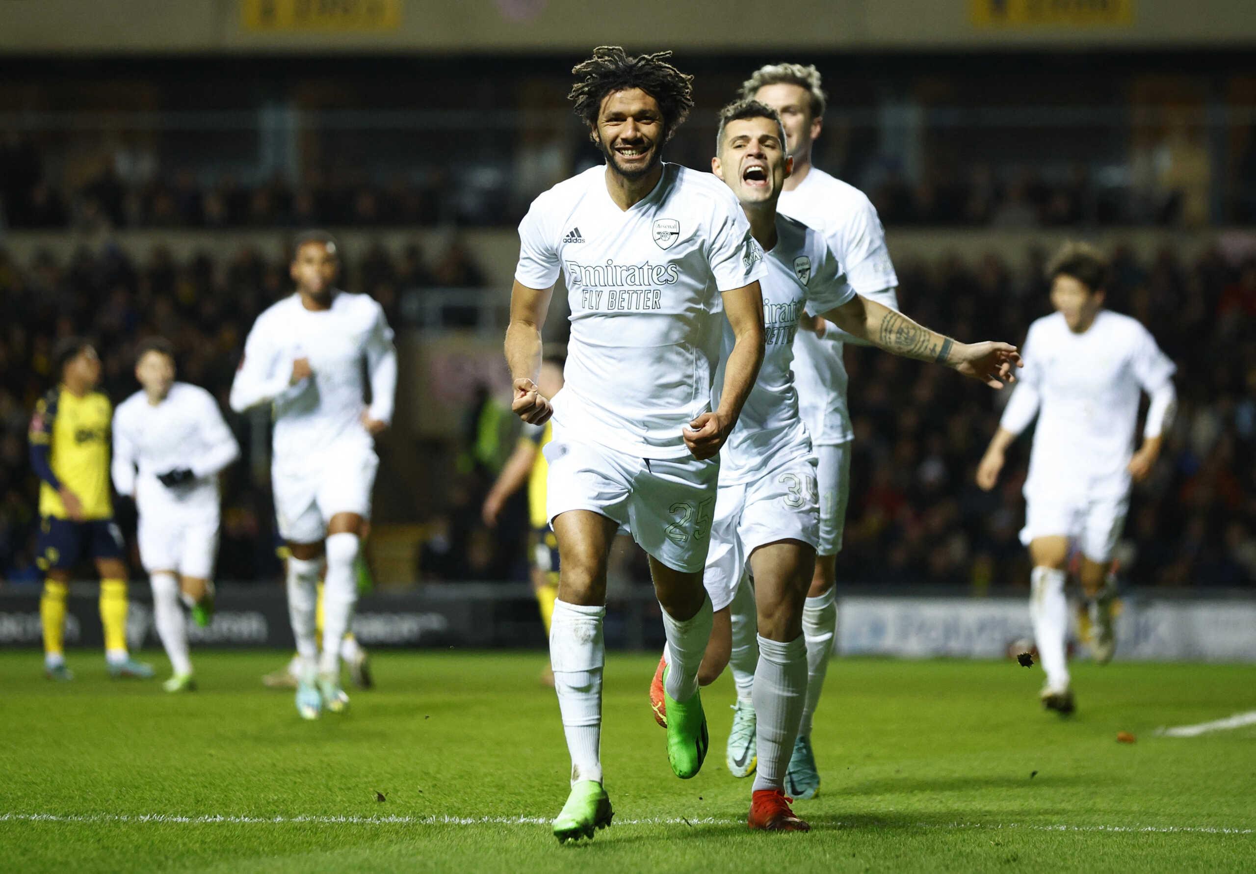 Soccer Football - FA Cup Third Round - Oxford United v Arsenal - Kassam Stadium, Oxford, Britain - January 9, 2023 Arsenal's Mohamed Elneny celebrates scoring their first goal with teammates Action Images via Reuters