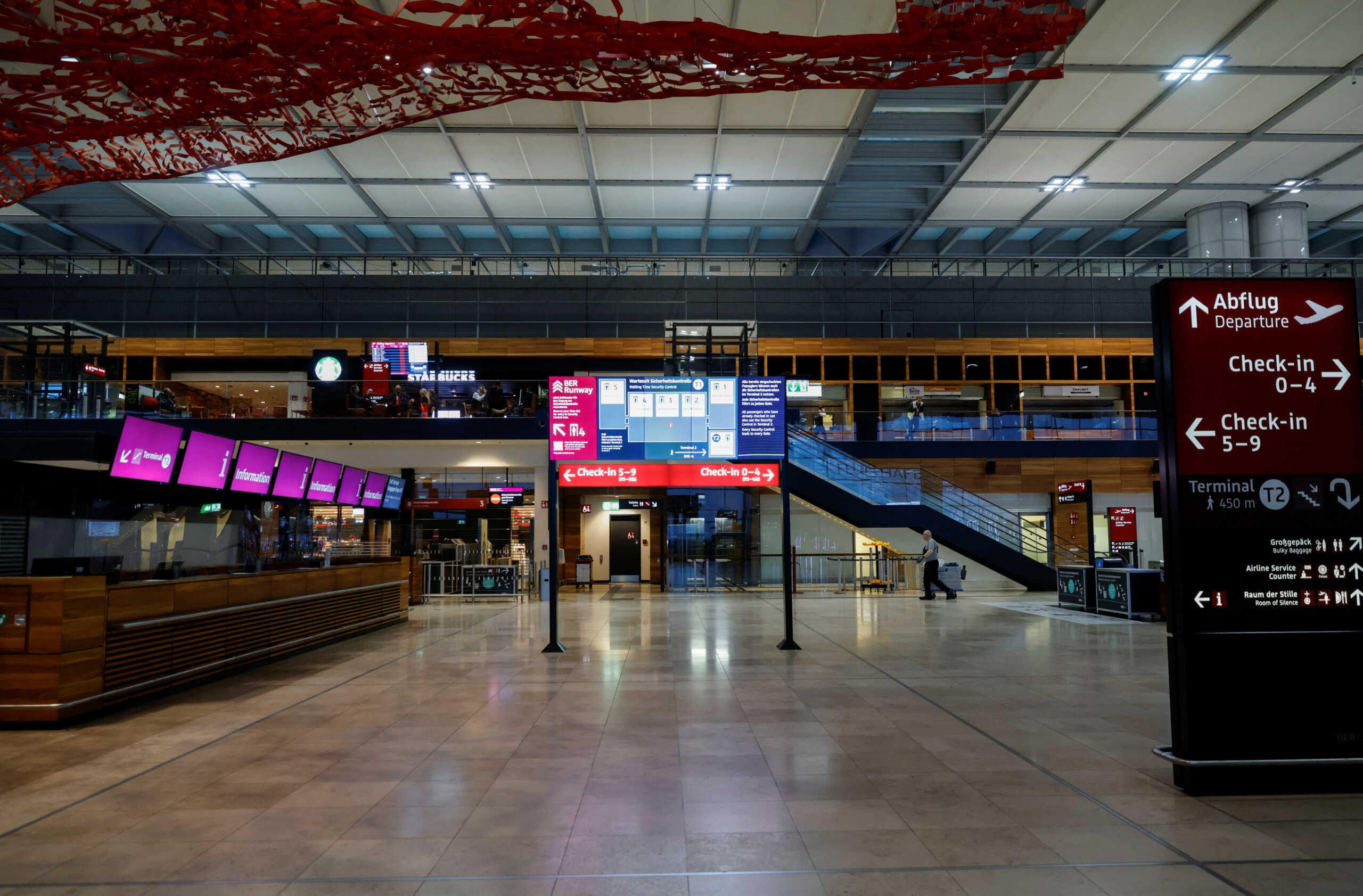 A view shows empty check-in counters during a general strike by employees over pay demands, at the Berlin Brandenburg Airport (BER), in Schoenefeld near Berlin, Germany January 25, 2023. REUTERS