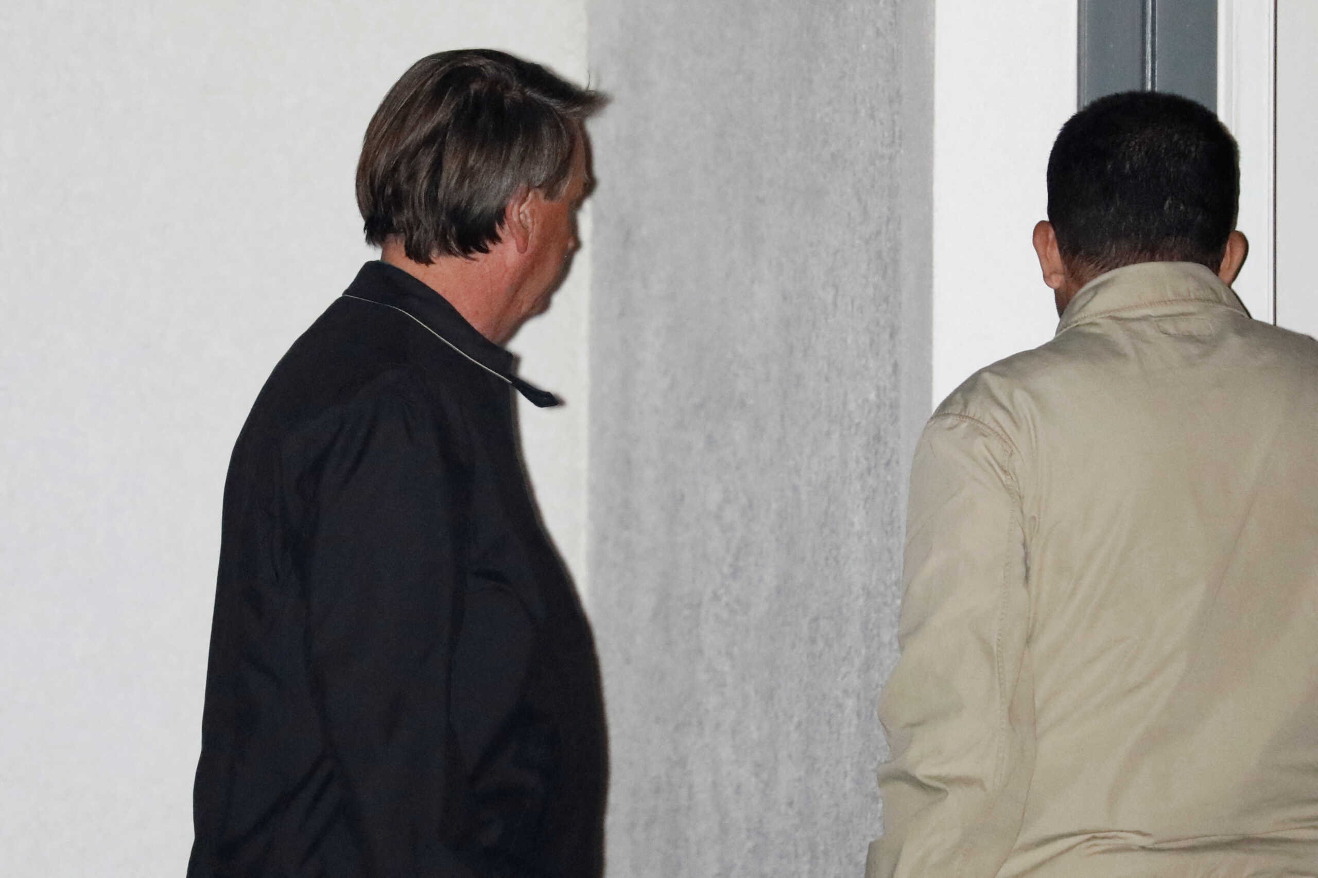 Former Brazilian President Jair Bolsonaro arrives to the house where he is staying after being discharged from the hospital, in Kissimmee, Florida, U.S., January 10, 2023. REUTERS