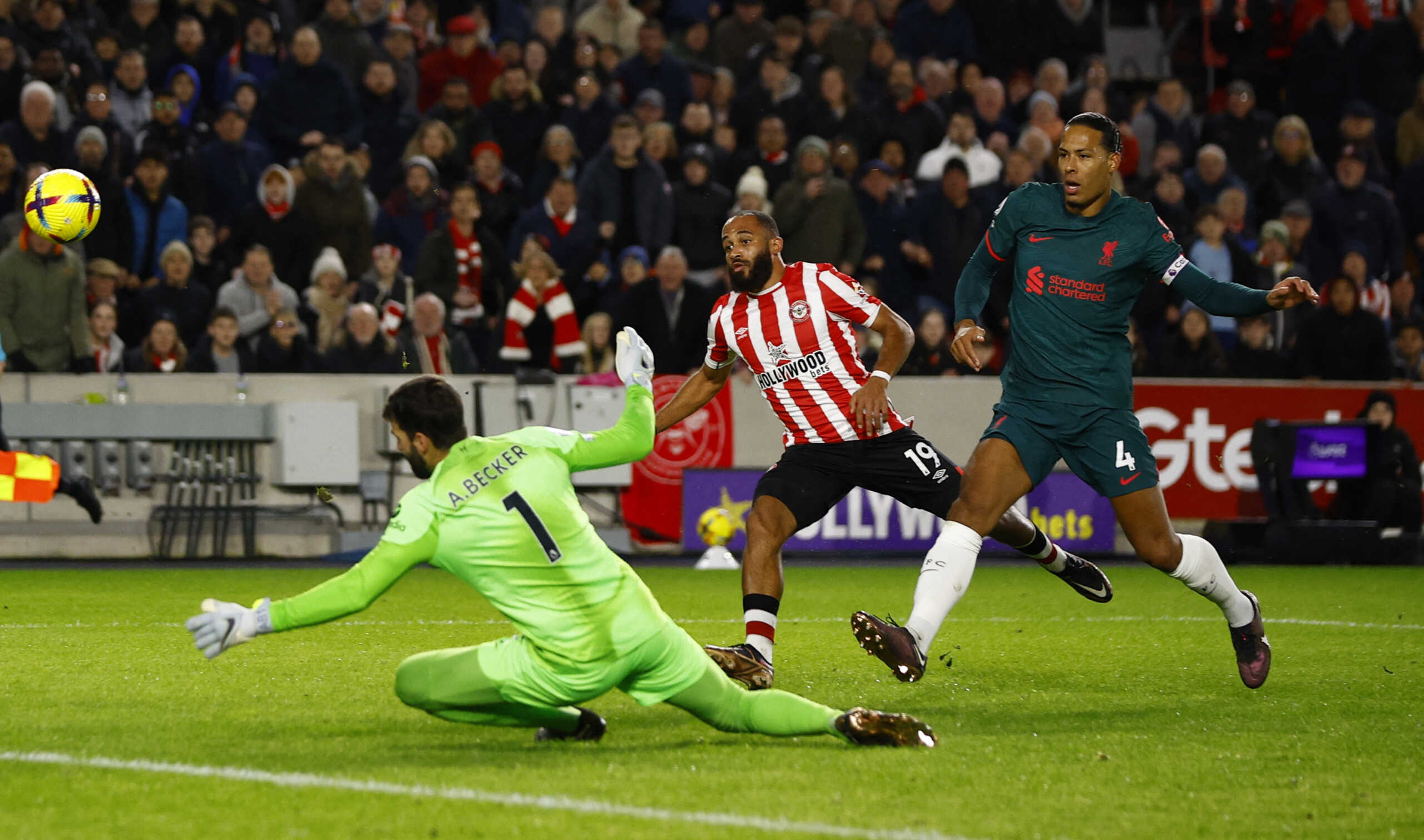 Soccer Football - Premier League - Brentford v Liverpool - Brentford Community Stadium, London, Britain - January 2, 2023 Liverpool's Alisson saves from Brentford's Bryan Mbeumo Action Images via Reuters