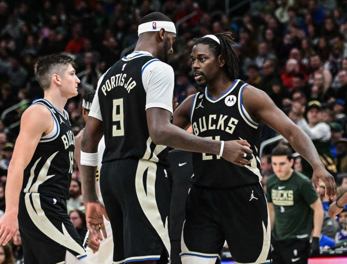 Jan 16, 2023; Milwaukee, Wisconsin, USA; Milwaukee Bucks guard Jrue Holiday (21) reacts with forward Bobby Portis (9) after scoring a basket in the fourth quarter during game against the Indiana Pacers at Fiserv Forum. Mandatory Credit: Benny Sieu-USA TODAY Sports