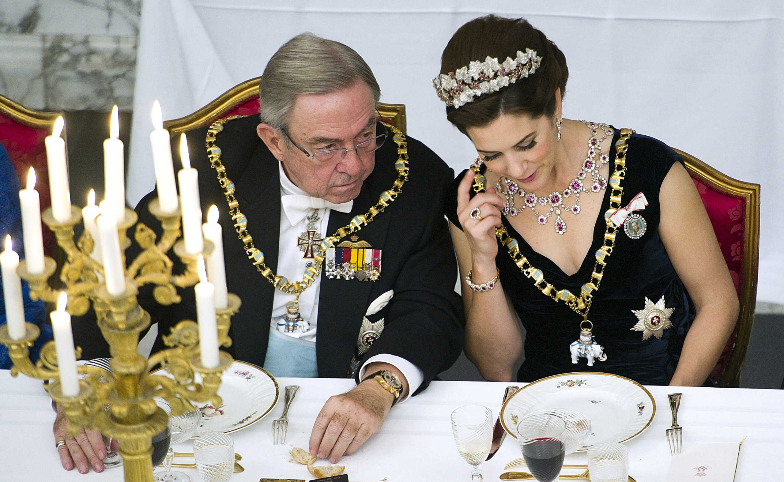 King Constantine II and Crown Princess Mary of Denmark at the gala dinner held at Christiansborg Castle in Copenhagen Denmark in celebration of Queen Margrethe's 40th reign anniversary January 15, 2012. Ritzau Scanpix 2023