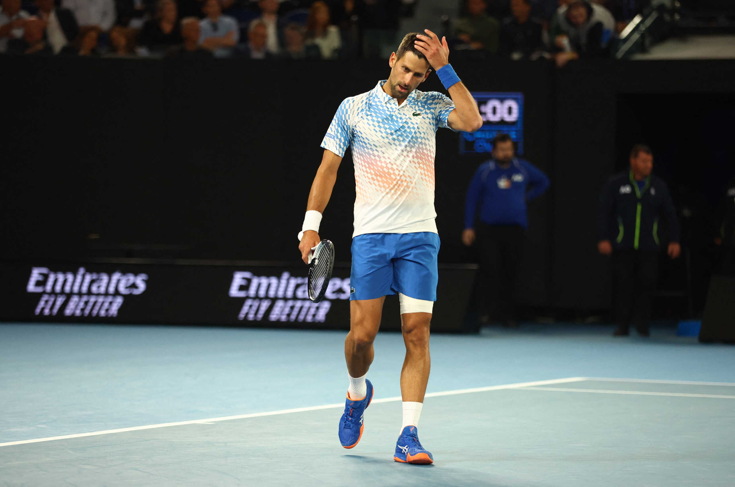 Tennis - Australian Open - Melbourne Park, Melbourne, Australia - January 19, 2023 Serbia's Novak Djokovic reacts during his second round match against France's Enzo Couacaud REUTERS