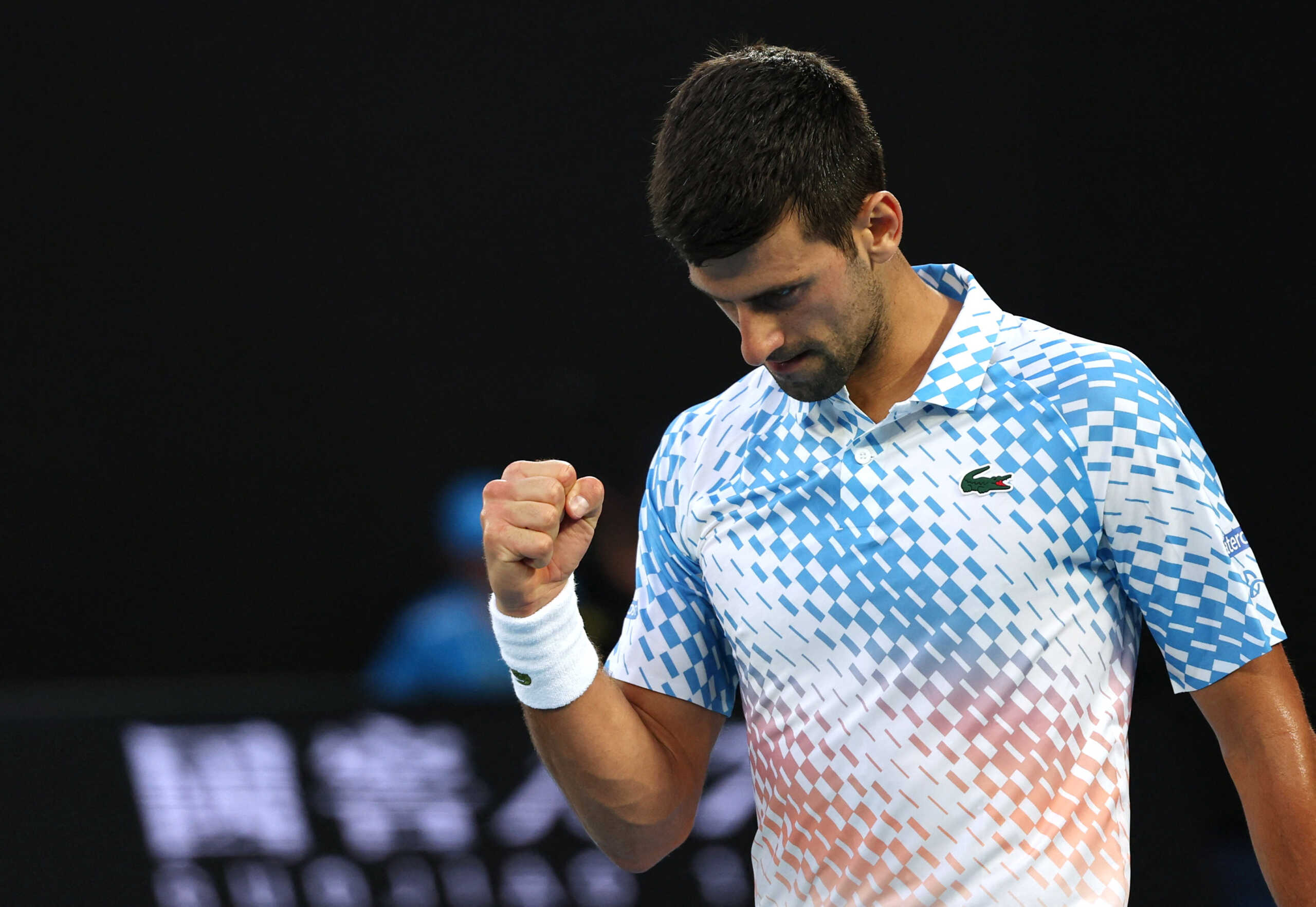 Tennis - Australian Open - Melbourne Park, Melbourne, Australia - January 23, 2023 Serbia's Novak Djokovic reacts during his fourth round match against Australia's Alex De Minaur REUTERS
