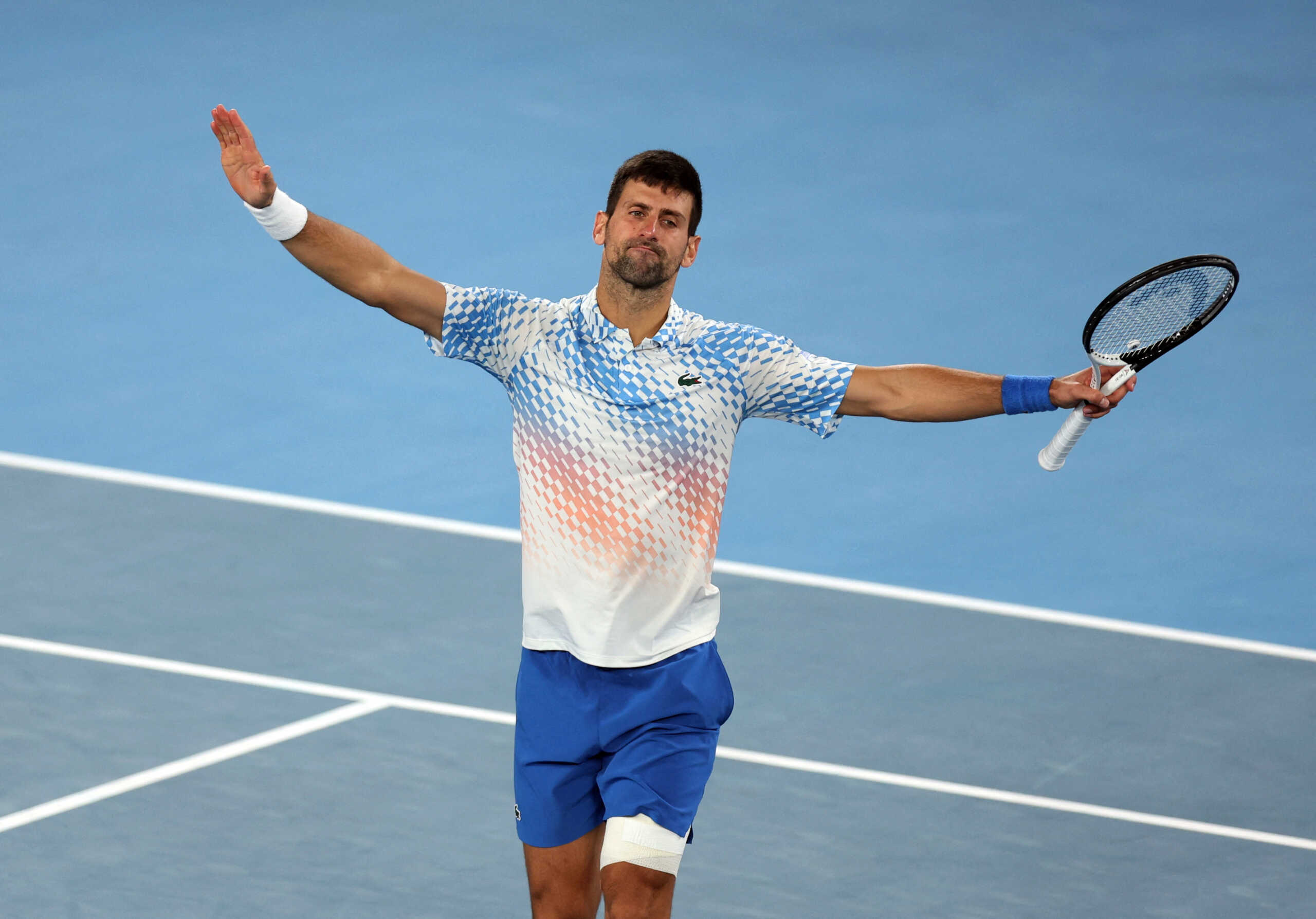 Tennis - Australian Open - Melbourne Park, Melbourne, Australia - January 25, 2023 Serbia’s Novak Djokovic celebrates winning his quarter final match against Russia’s Andrey Rublev REUTERS