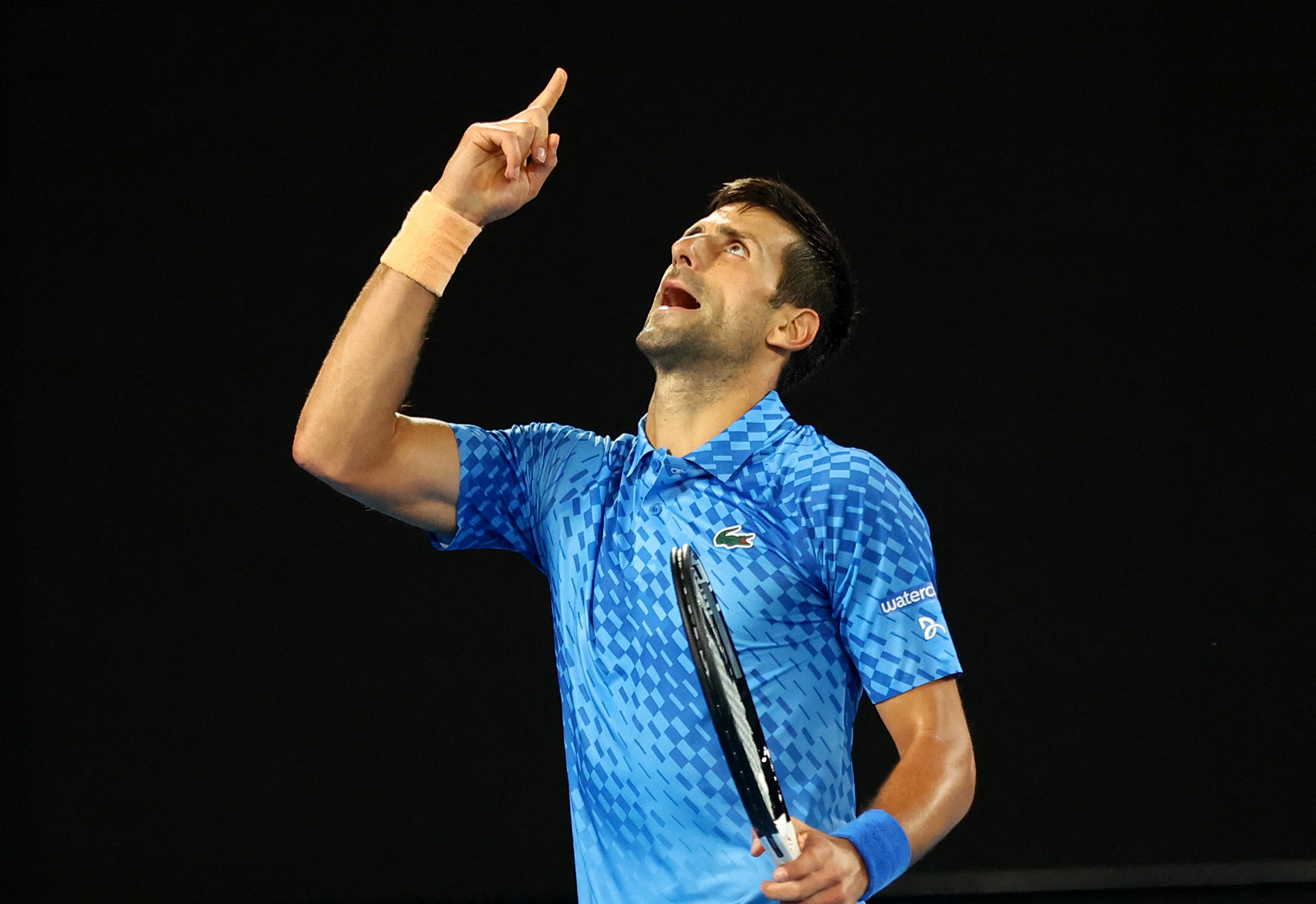 Tennis - Australian Open - Melbourne Park, Melbourne, Australia - January 17, 2023 Serbia's Novak Djokovic reacts during his first round match against Spain's Roberto Carballes Baena REUTERS