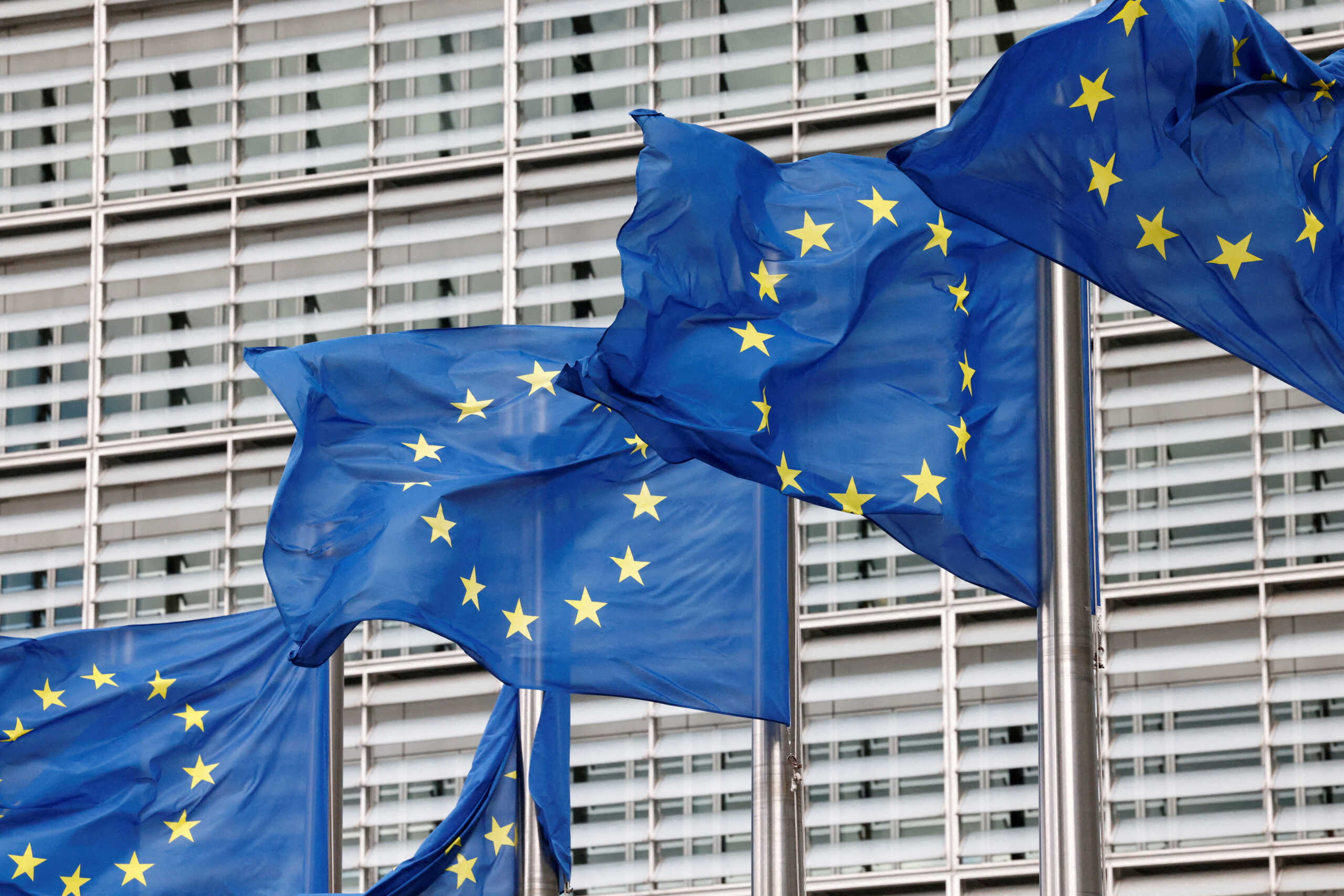 FILE PHOTO: European Union flags flutter outside the EU Commission headquarters in Brussels, Belgium, September 28, 2022. REUTERS