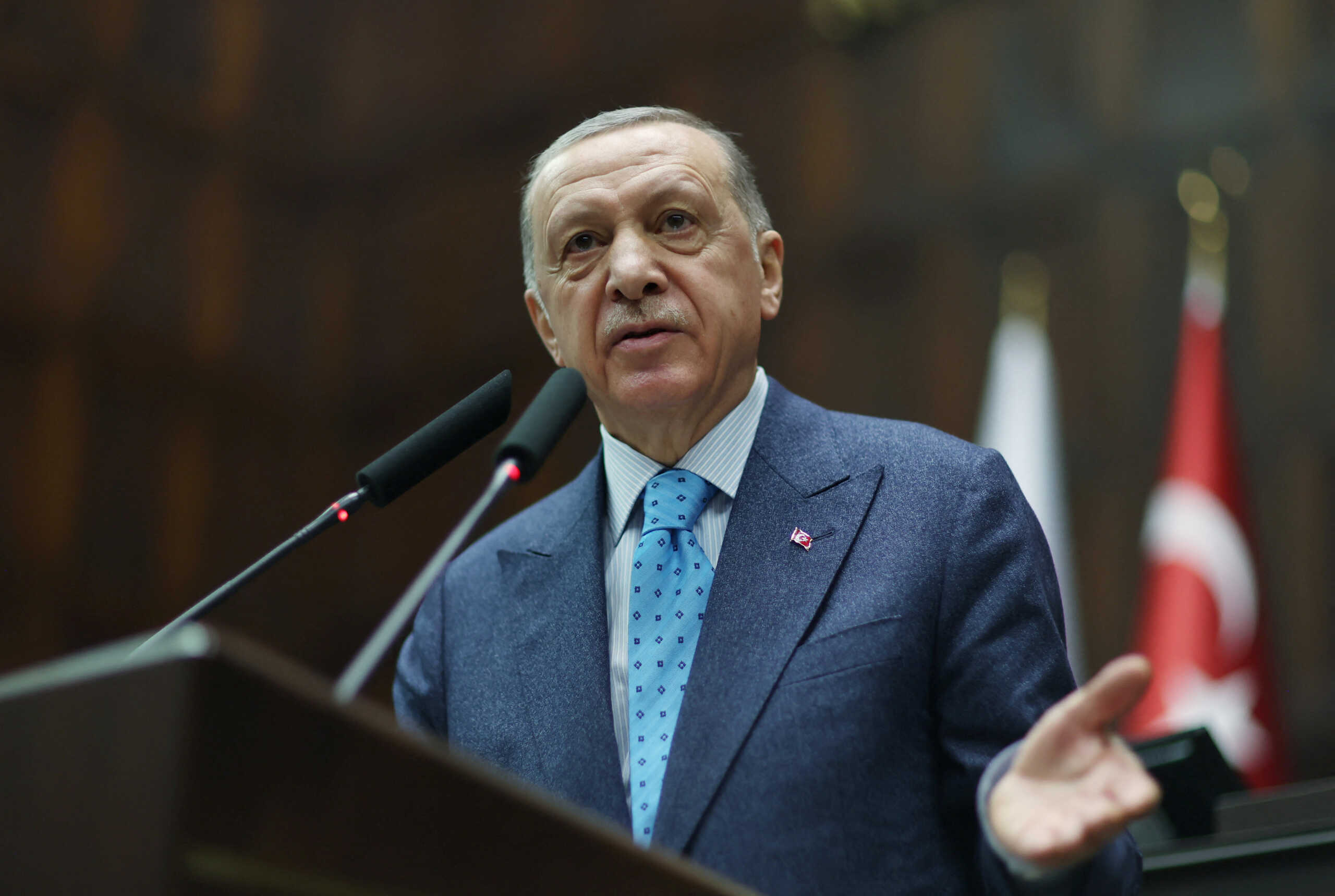 Turkish President Tayyip Erdogan addresses lawmakers of his AK Party during a meeting at the parliament in Ankara, Turkey January 18, 2023. Presidential Press Office