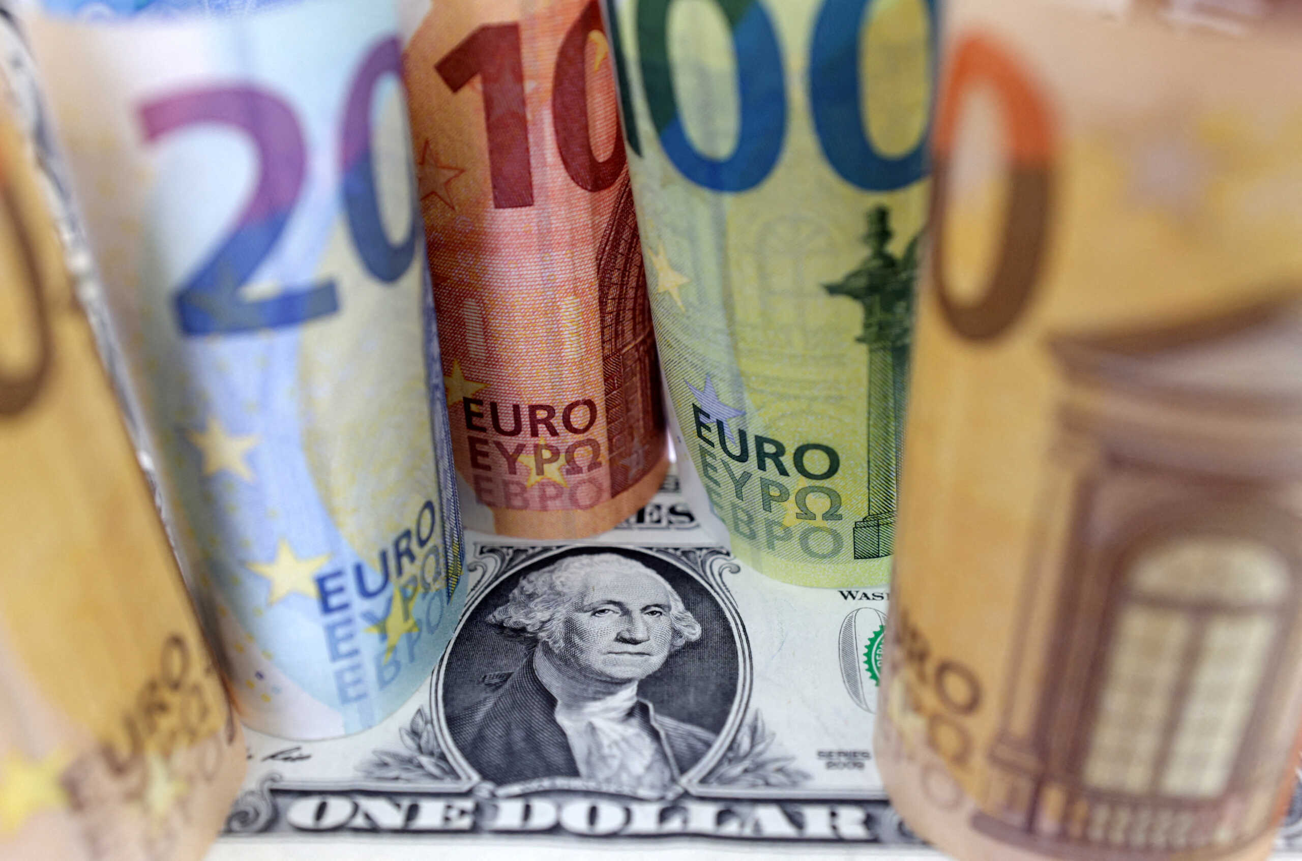 FILE PHOTO: U.S. Dollar and Euro banknotes are seen in this illustration taken July 17, 2022. REUTERS