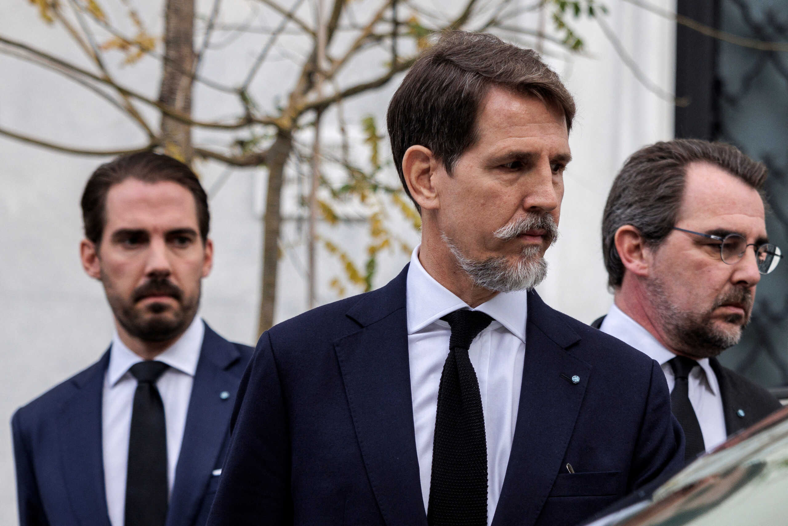 Sons of Greece's former King Constantine II, Crown Prince Pavlos, Prince Nikolaos and Prince Philippos leave the Maximos Mansion following a meeting with members of the Greek government, in Athens, Greece, January 11, 2023. REUTERS
