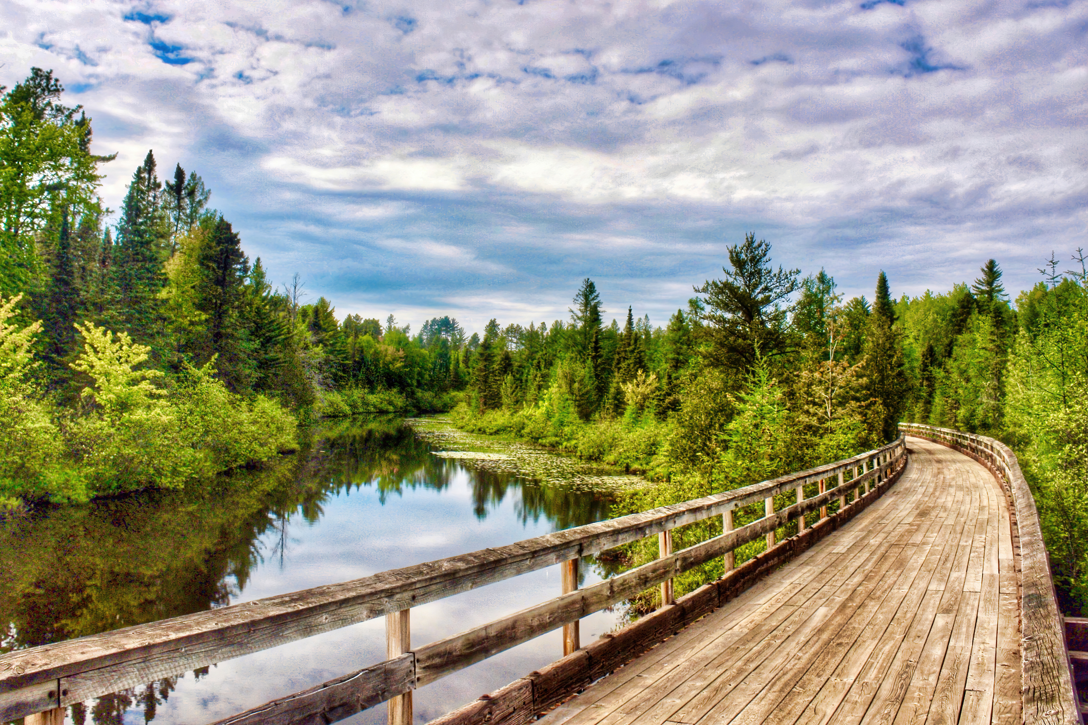 Riding across one of the trestles on the Bear Skin State Trail, South of Minocqua, WI.