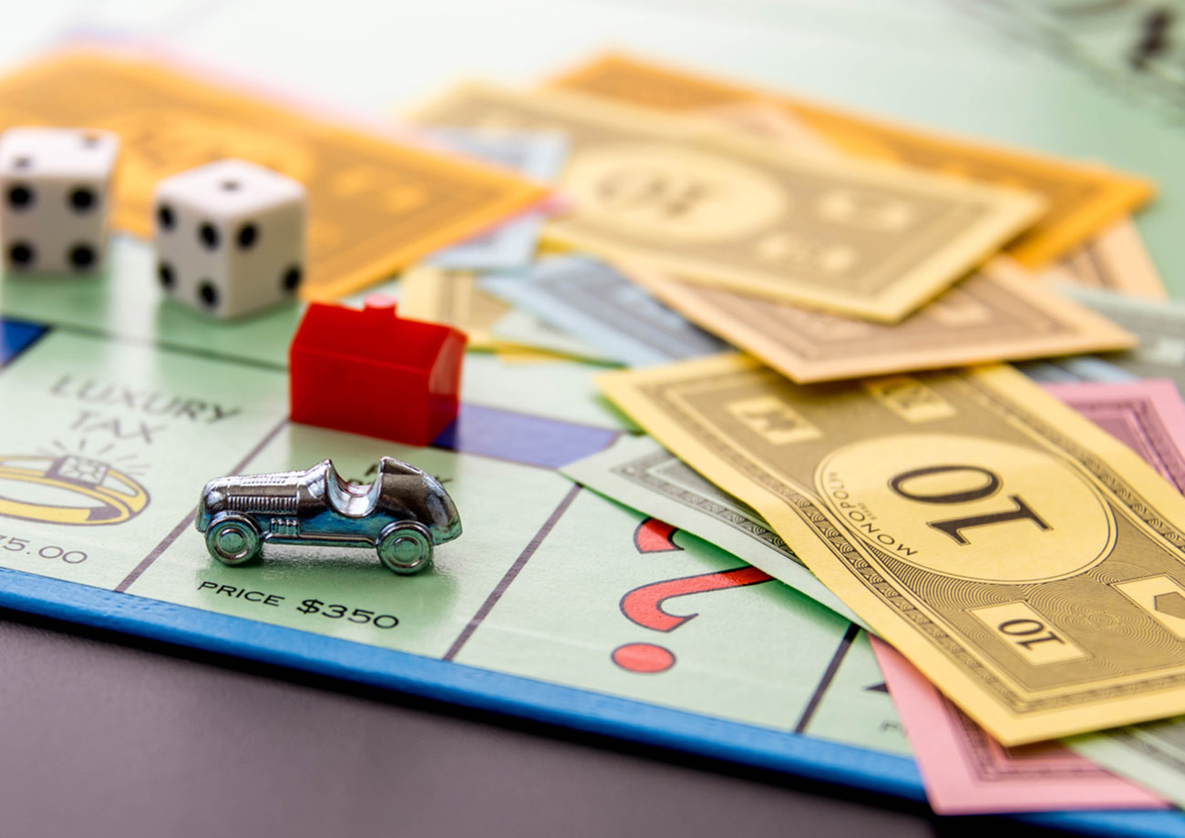 Houston, TX, USA - February 8, 2015: Monopoly Board Game - car on Park Place with hotel