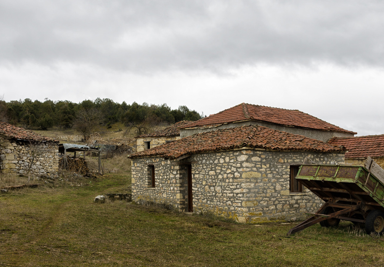 February 3rd 2018 - Vrontero village, Florina, Greece - Old stone houses under an overcast sky