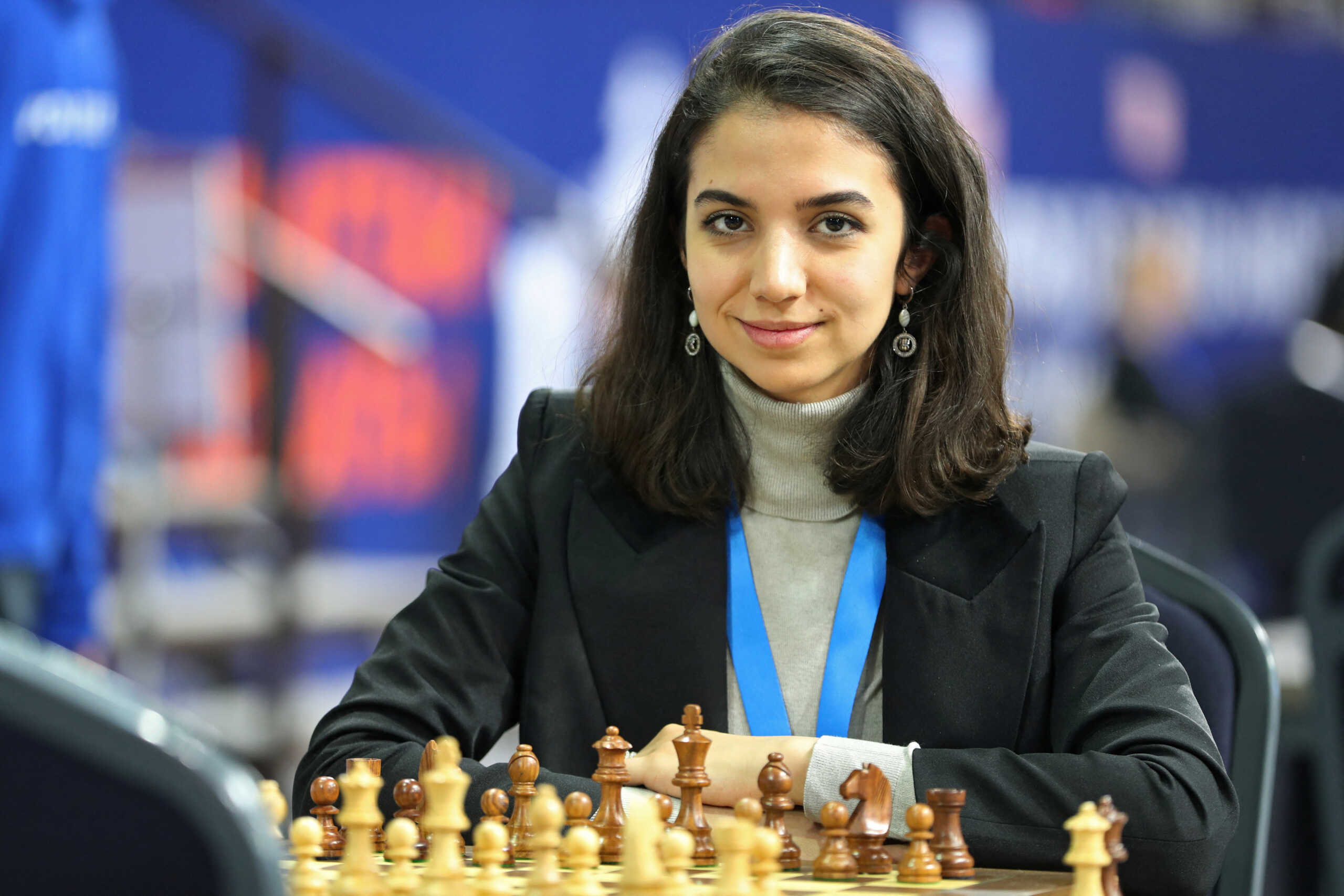 Chess - FIDE World Rapid and Blitz Championships - Rapid Women - Almaty, Kazakhstan - December 28, 2022. Sara Khadem of Iran sits in front of a chess board. REUTERS