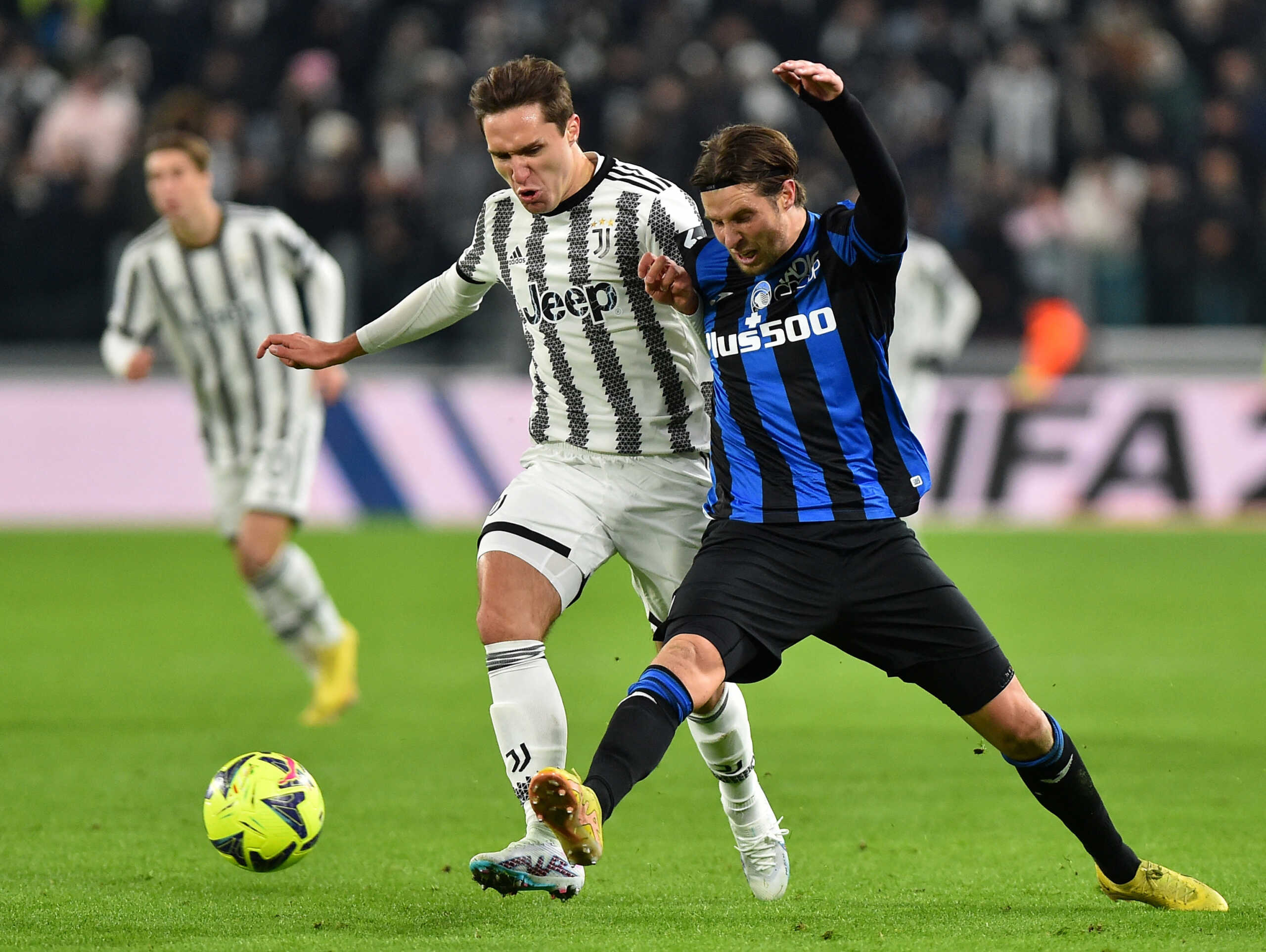 Soccer Football - Serie A - Juventus v Atalanta - Allianz Stadium, Turin, Italy - January 22, 2023 Juventus' Federico Chiesa in action with Atalanta's Hans Hateboer REUTERS