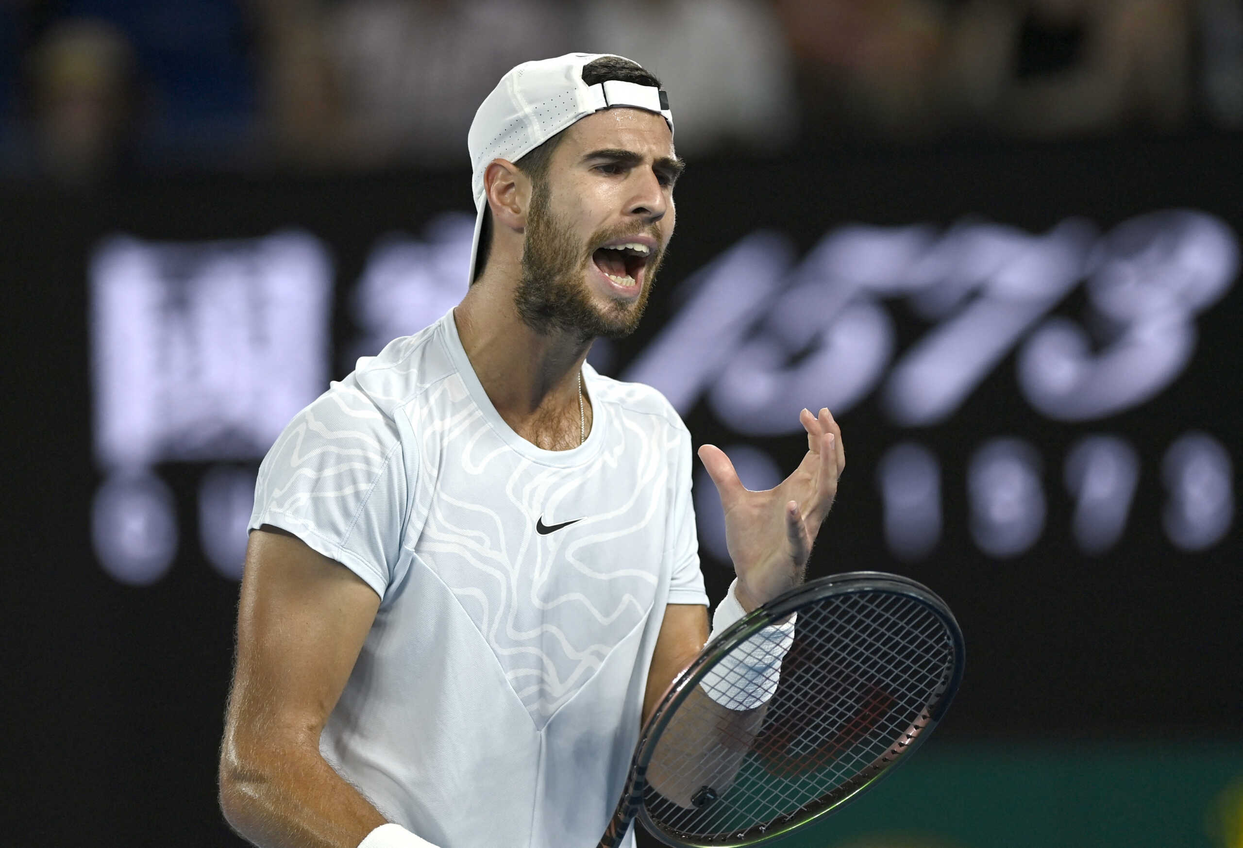 Tennis - Australian Open - Melbourne Park, Melbourne, Australia - January 24, 2023 Russia's Karen Khachanov reacts during his quarter final match against Sebastian Korda of the U.S. REUTERS