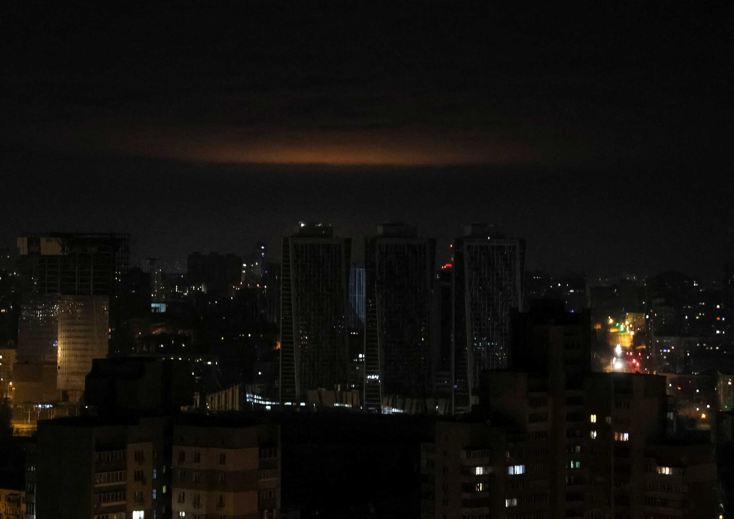 A glow from explosion is seen over the city's skyline during a Russian drones strike, amid Russia's attack on Ukraine, in Kyiv, Ukraine January 1, 2023. REUTERS