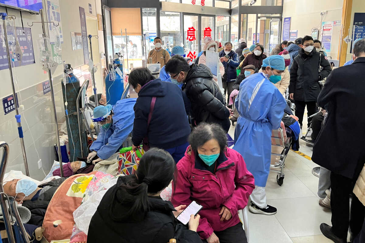 Medical workers attend to patients at the emergency department of Zhongshan Hospital, amid the coronavirus disease (COVID-19) outbreak in Shanghai, China January 3, 2023. REUTERS