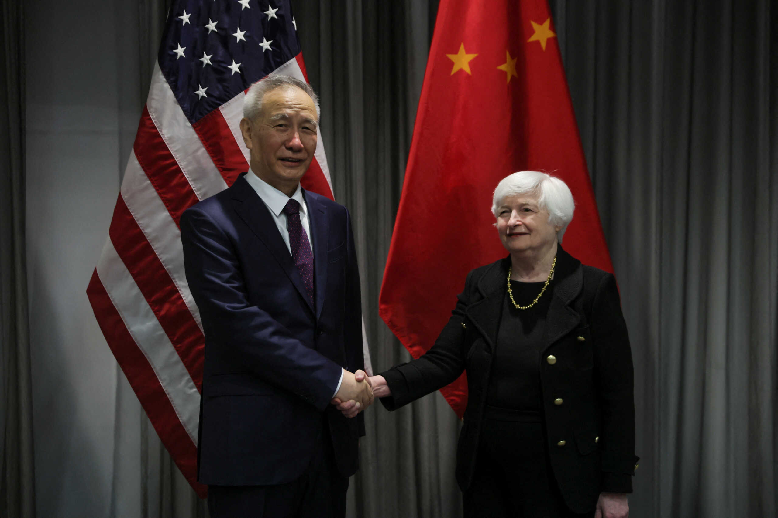 U.S. Treasury Secretary Janet Yellen shakes hands with Chinese Vice Premier Liu He as they meet for talks in Zurich, Switzerland, January, 18, 2023. REUTERS