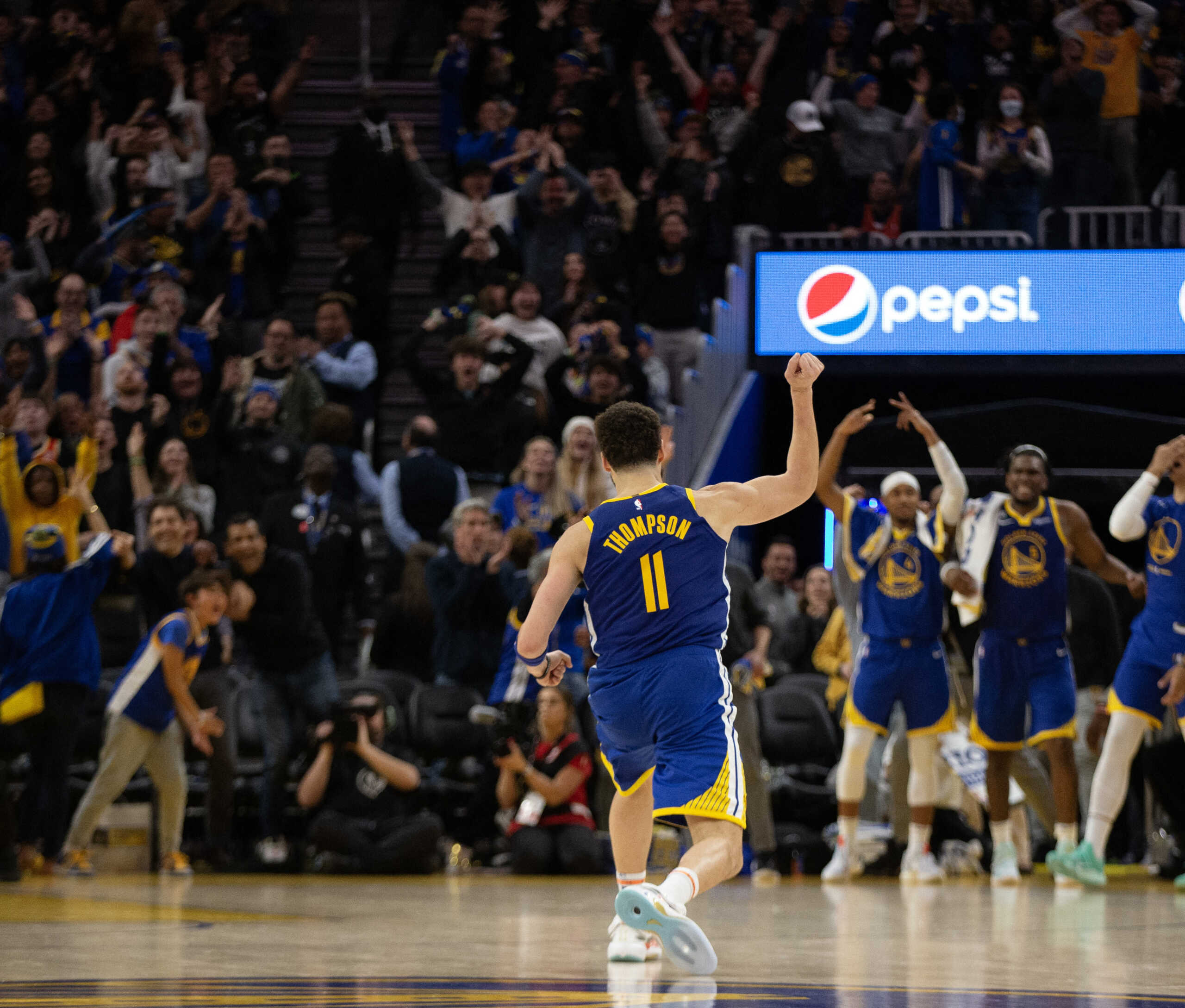 Jan 2, 2023; San Francisco, California, USA; Golden State Warriors guard Klay Thompson (11) celebrates a 3-point basket against the Atlanta Hawks during the first overtime at Chase Center. Mandatory Credit: D. Ross Cameron-USA TODAY Sports