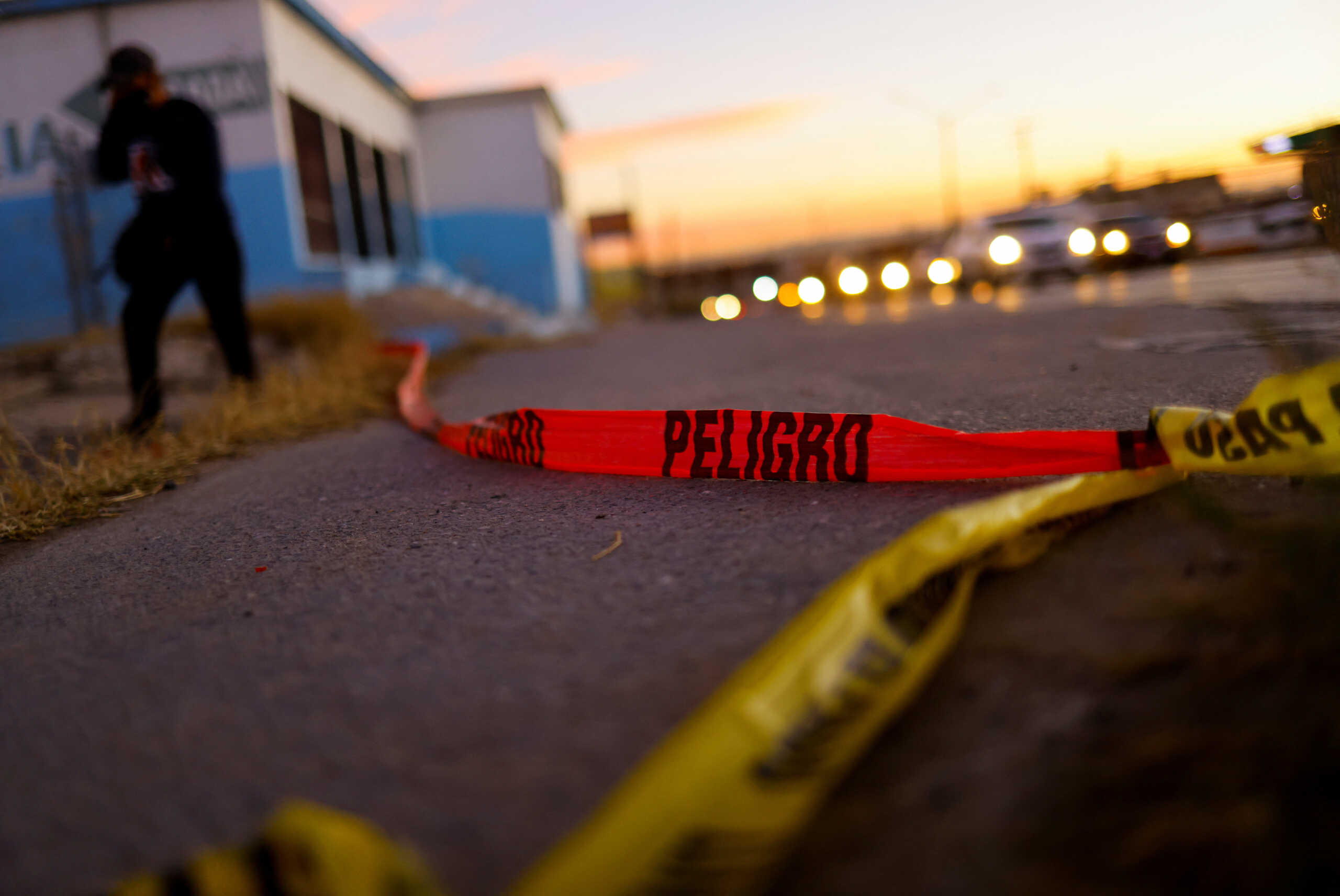 View of pieces of police cordon near the place where Ernesto Alfredo Pinon de la Cruz, known as "El Neto", was injured in a chase with the police and died minutes later when he was transferred to the Chihuahua Attorney General's Office, days after he fled prison during a violent mass jail break, authorities said in a statement, in Ciudad Juarez, Mexico January 5, 2023. REUTERS