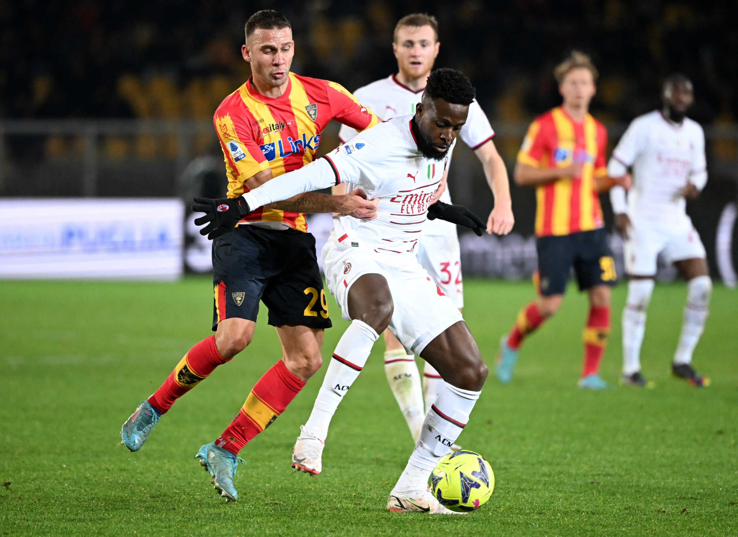 Soccer Football - Serie A - Lecce v AC Milan - Stadio Via del mare, Lecce, Italy - January 14, 2023 Lecce's Alexis Blin in action with AC Milan's Divock Origi REUTERS