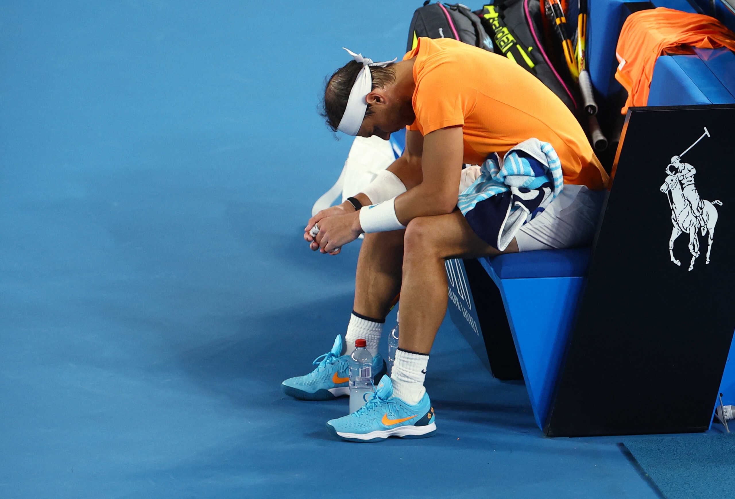 Tennis - Australian Open - Melbourne Park, Melbourne, Australia - January 18, 2023 Spain's Rafael Nadal before receiving medical attention during his second round match against Mackenzie Mcdonald of the U.S. REUTERS