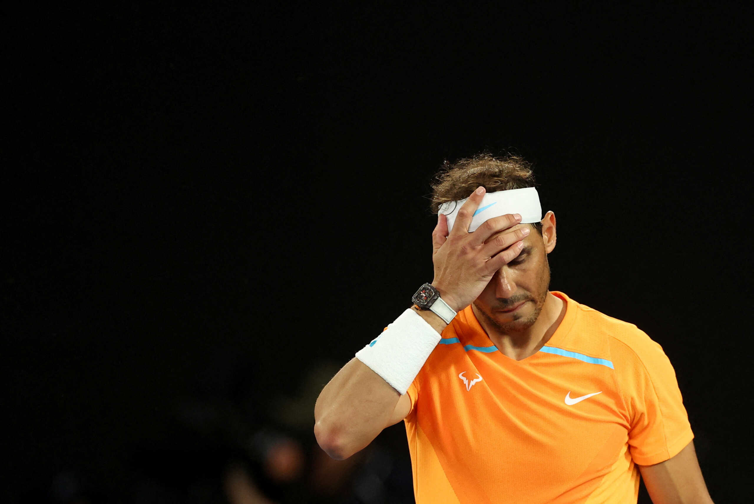 Tennis - Australian Open - Melbourne Park, Melbourne, Australia - January 18, 2023 Spain's Rafael Nadal looks dejected after losing his second round match against Mackenzie Mcdonald of the U.S. REUTERS
