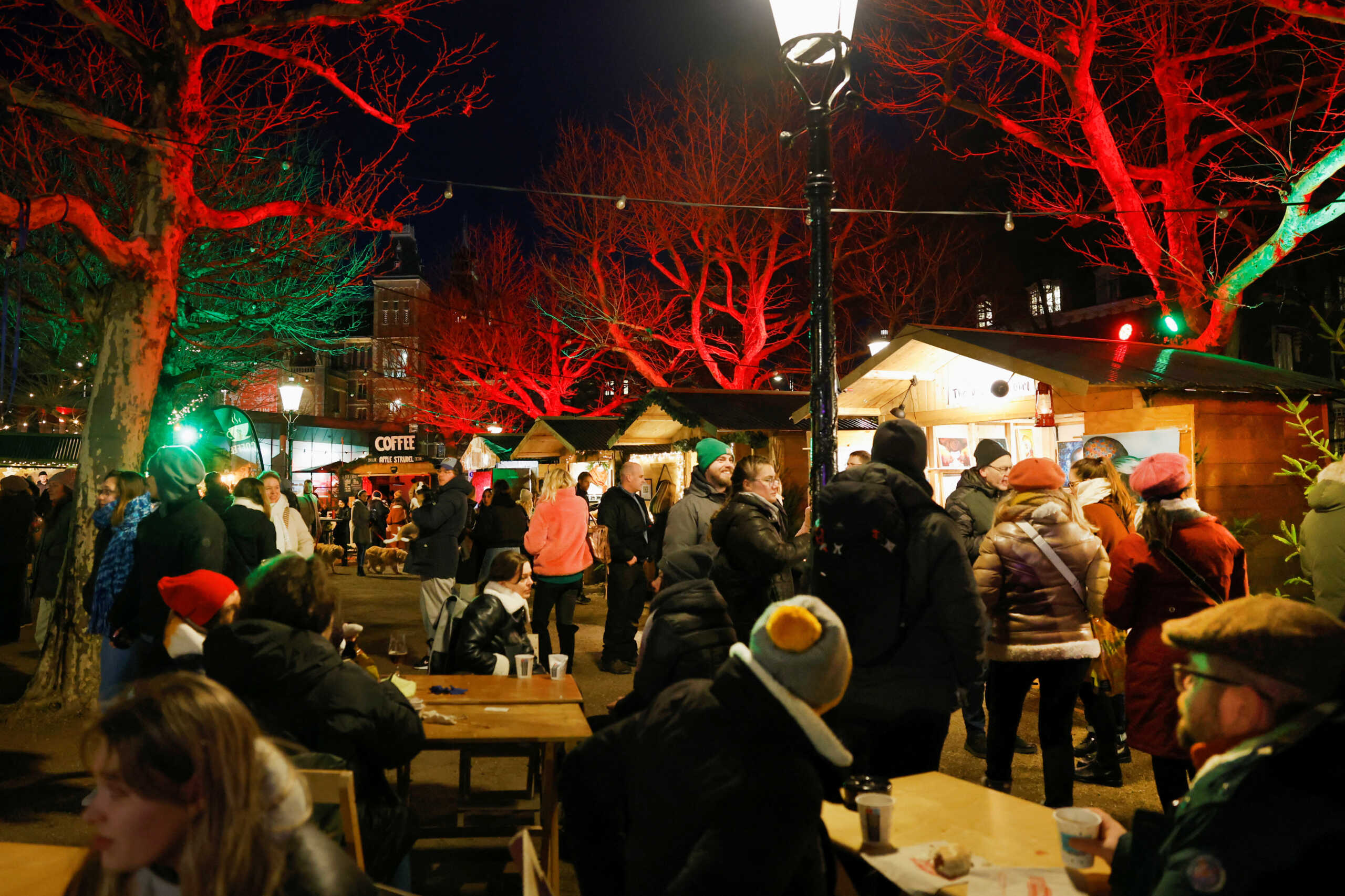 People visit a Christmas market in Amsterdam, Netherlands December 16, 2022. REUTERS