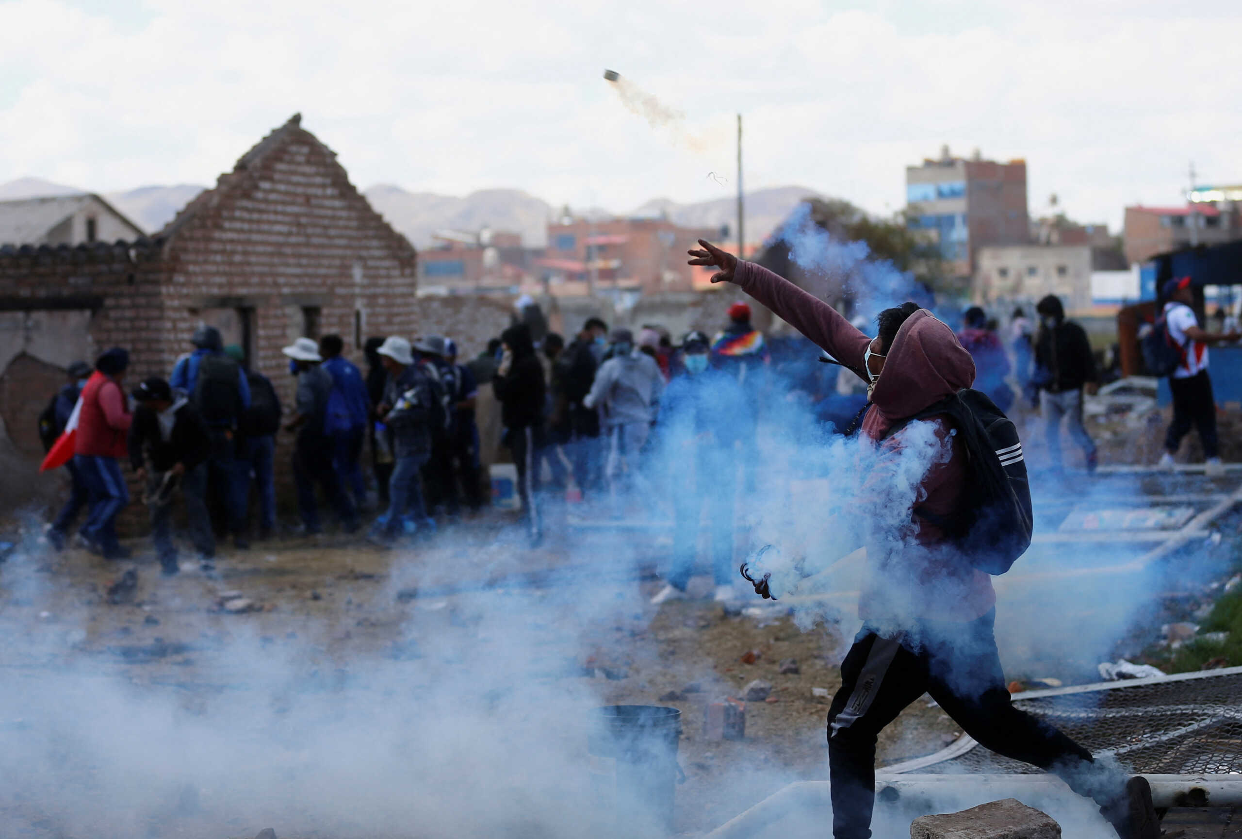 Demonstrators clash with security forces during a protest demanding early elections and the release of jailed former President Pedro Castillo, near the Juliaca airport, in Juliaca, Peru January 9, 2023. REUTERS