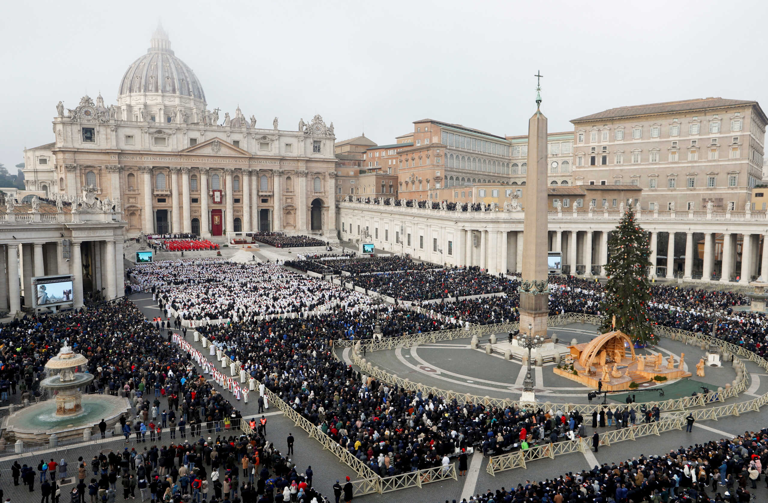 The faithful attend the funeral of former Pope Benedict in St. Peter's Square at the Vatican, January 5, 2023. REUTERS