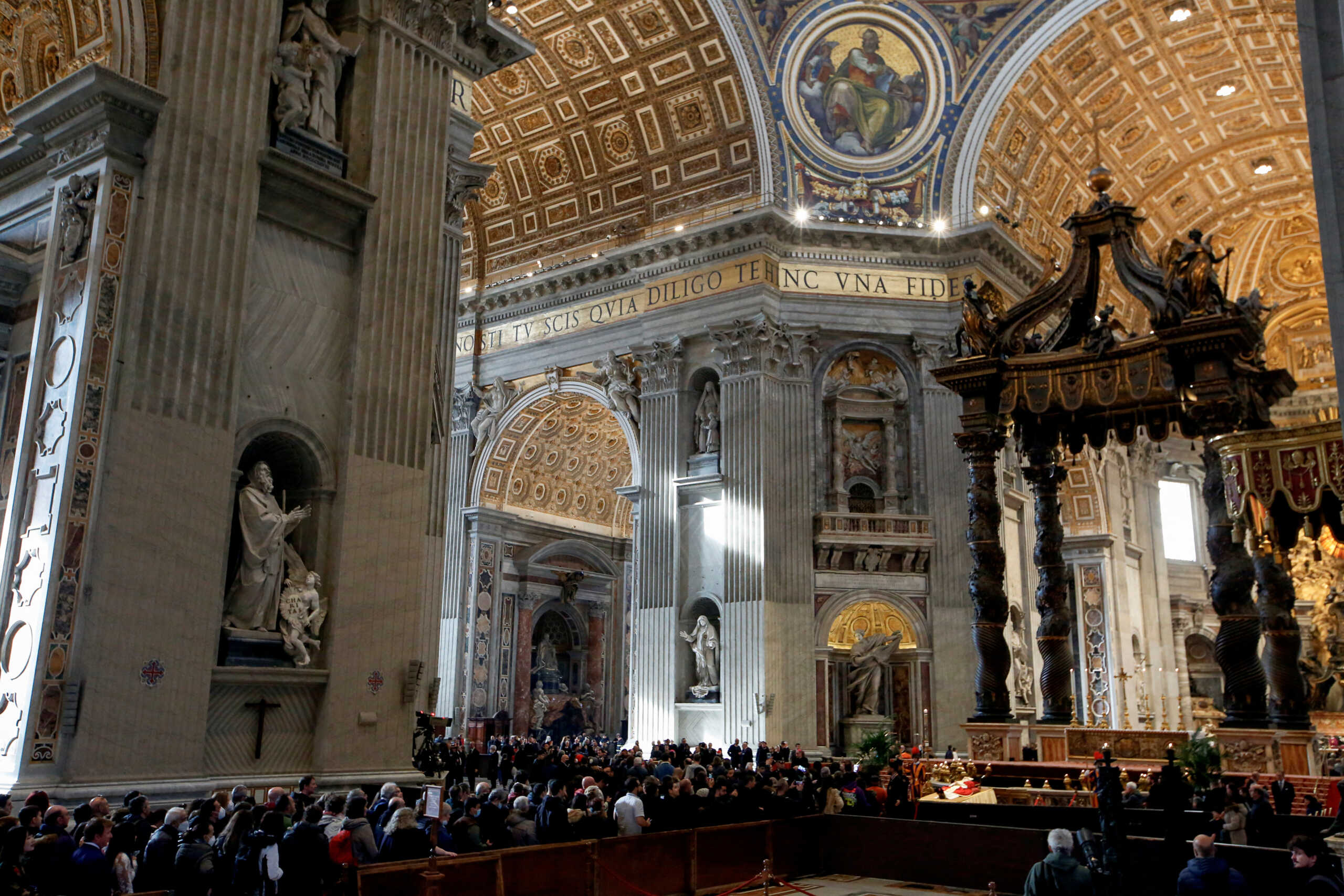The faithful pay homage to former Pope Benedict as his body lies in state at St. Peter's Basilica, at the Vatican, January 4, 2023. REUTERS
